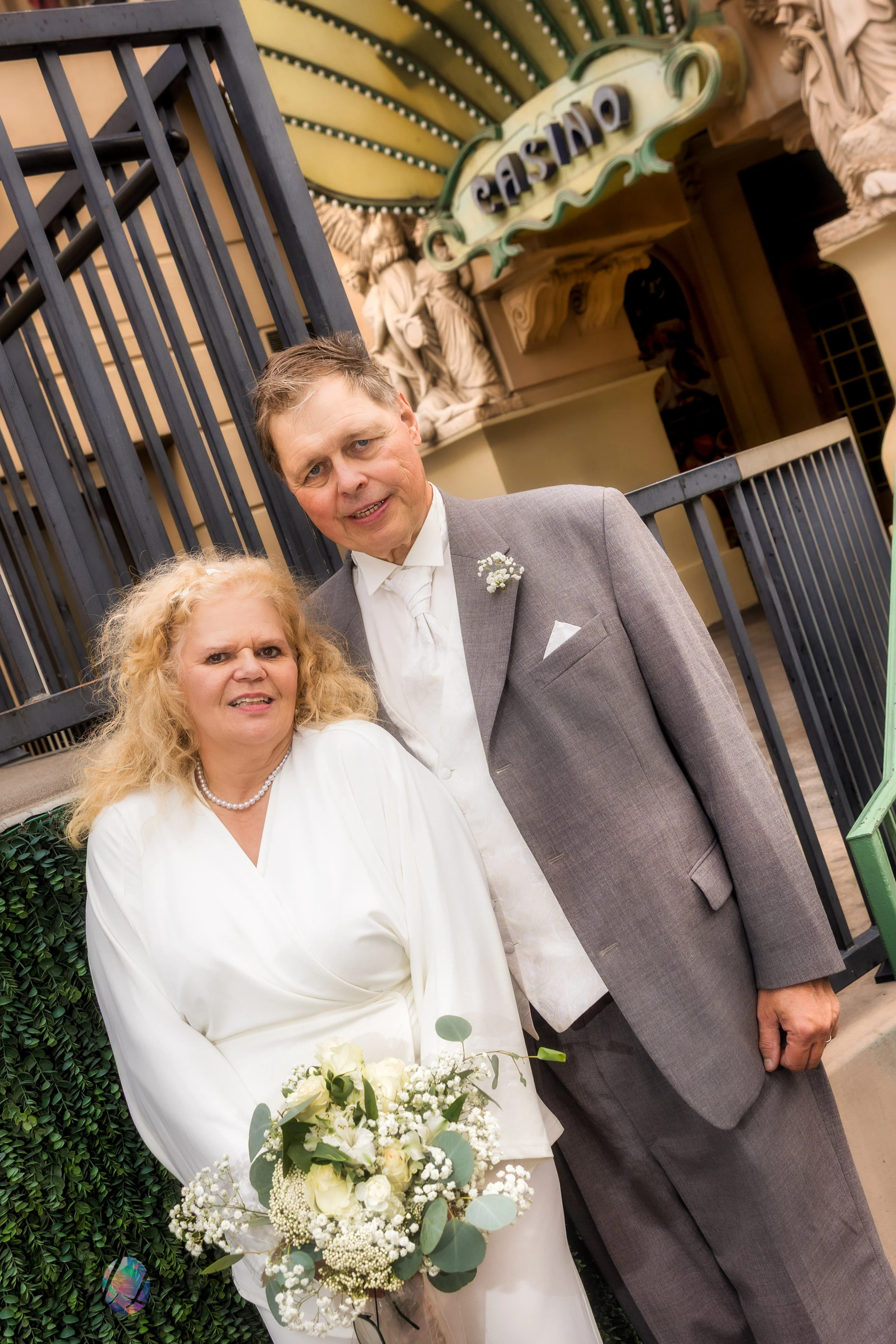 Couple kissing with Eiffel Tower at Paris Las Vegas in background