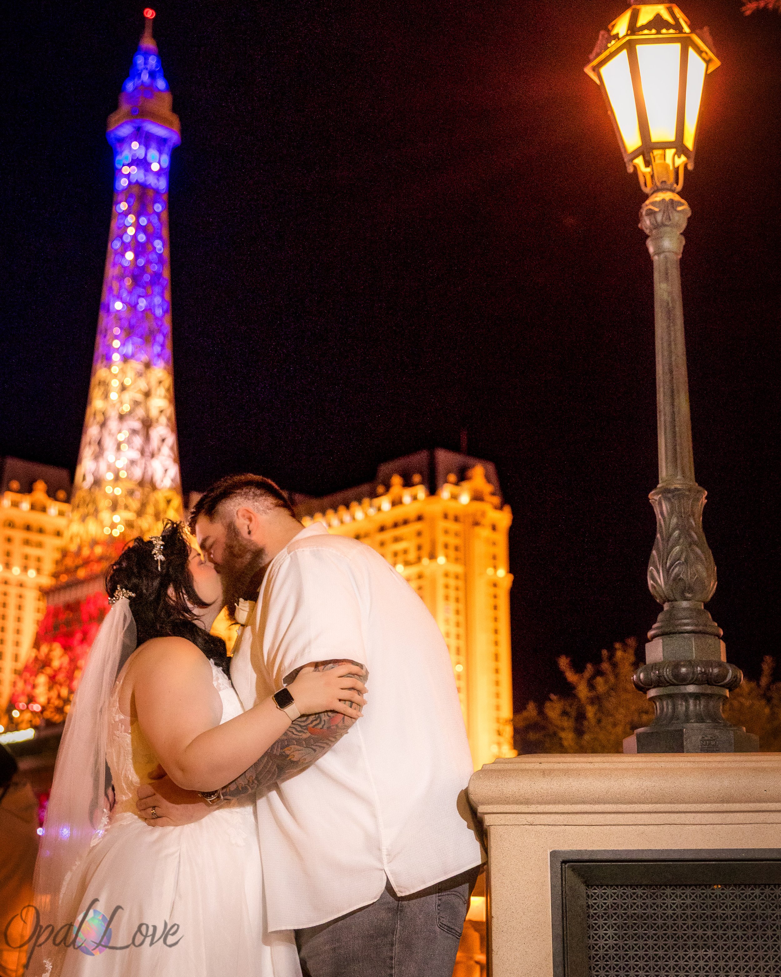 Couple at Paris Las Vegas Eiffel Tower during elopement session