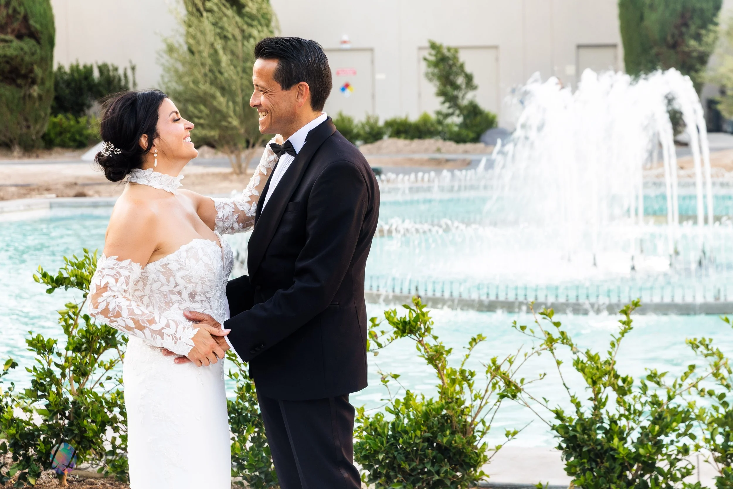 Bride and groom portrait surrounded by Caesars Palace architecture in Las Vegas