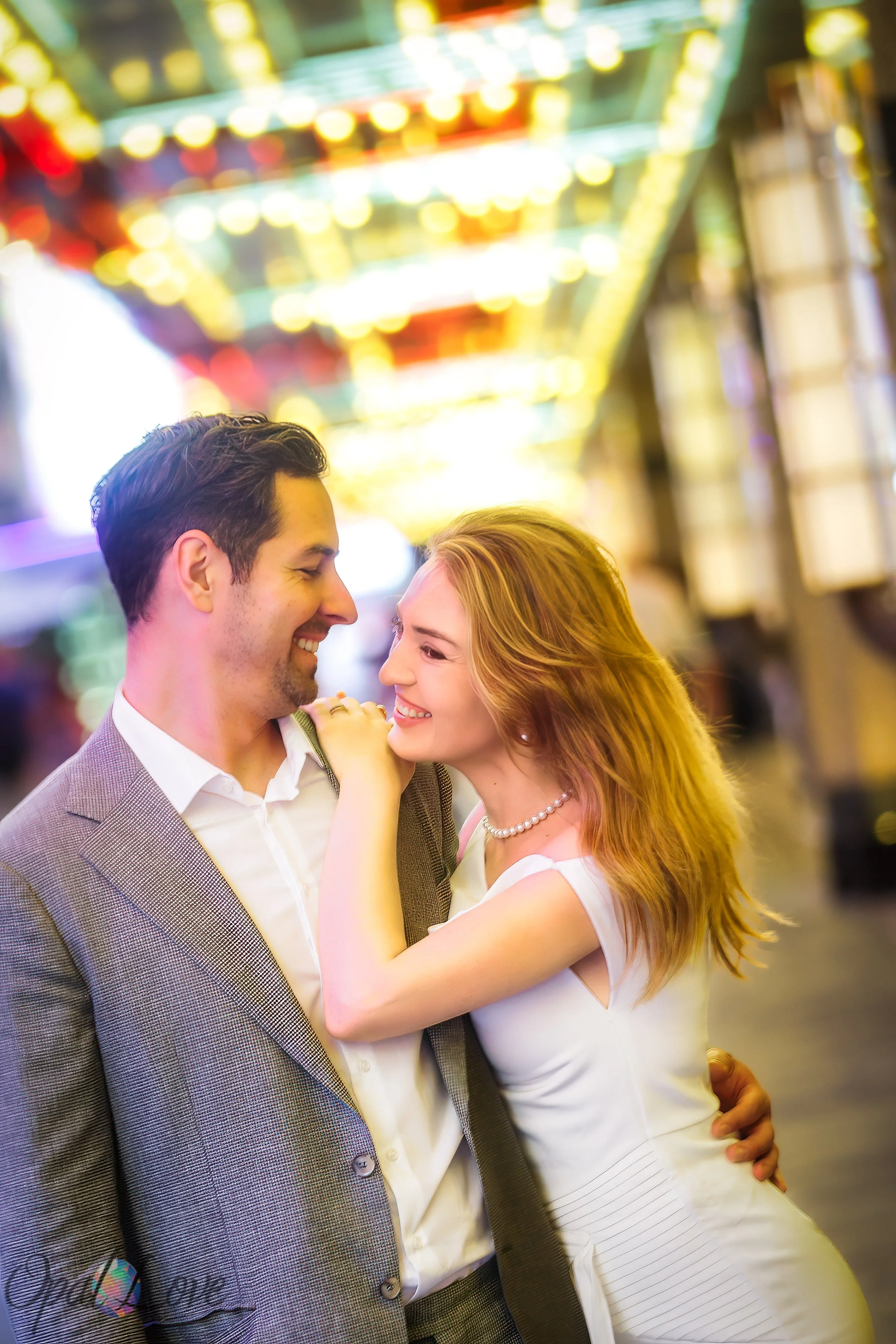 Bride and groom celebrating chapel wedding with post-ceremony photos on Fremont Street