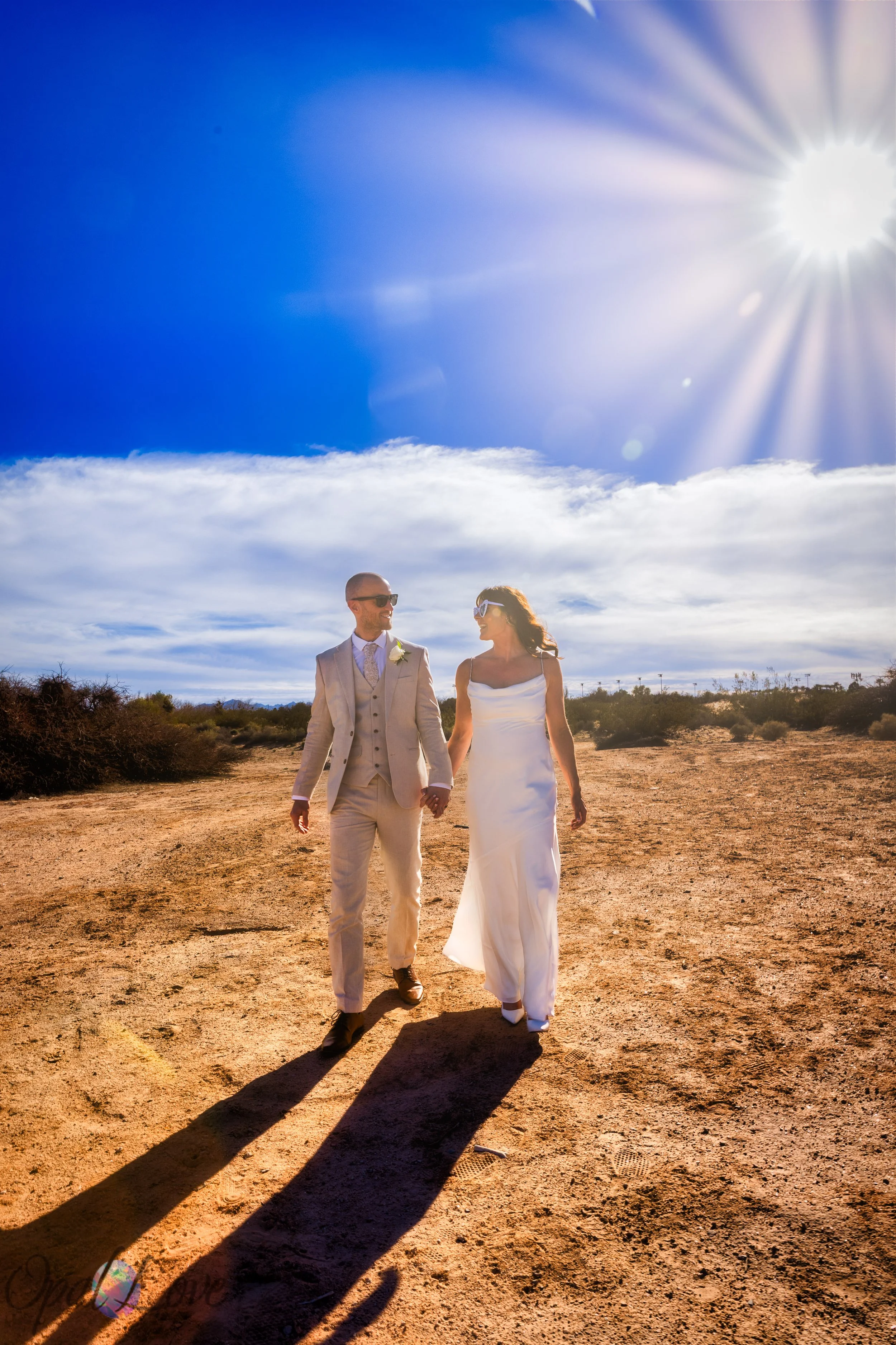 Couple sharing a kiss at Sunset Park during their Las Vegas elopement photo tour.