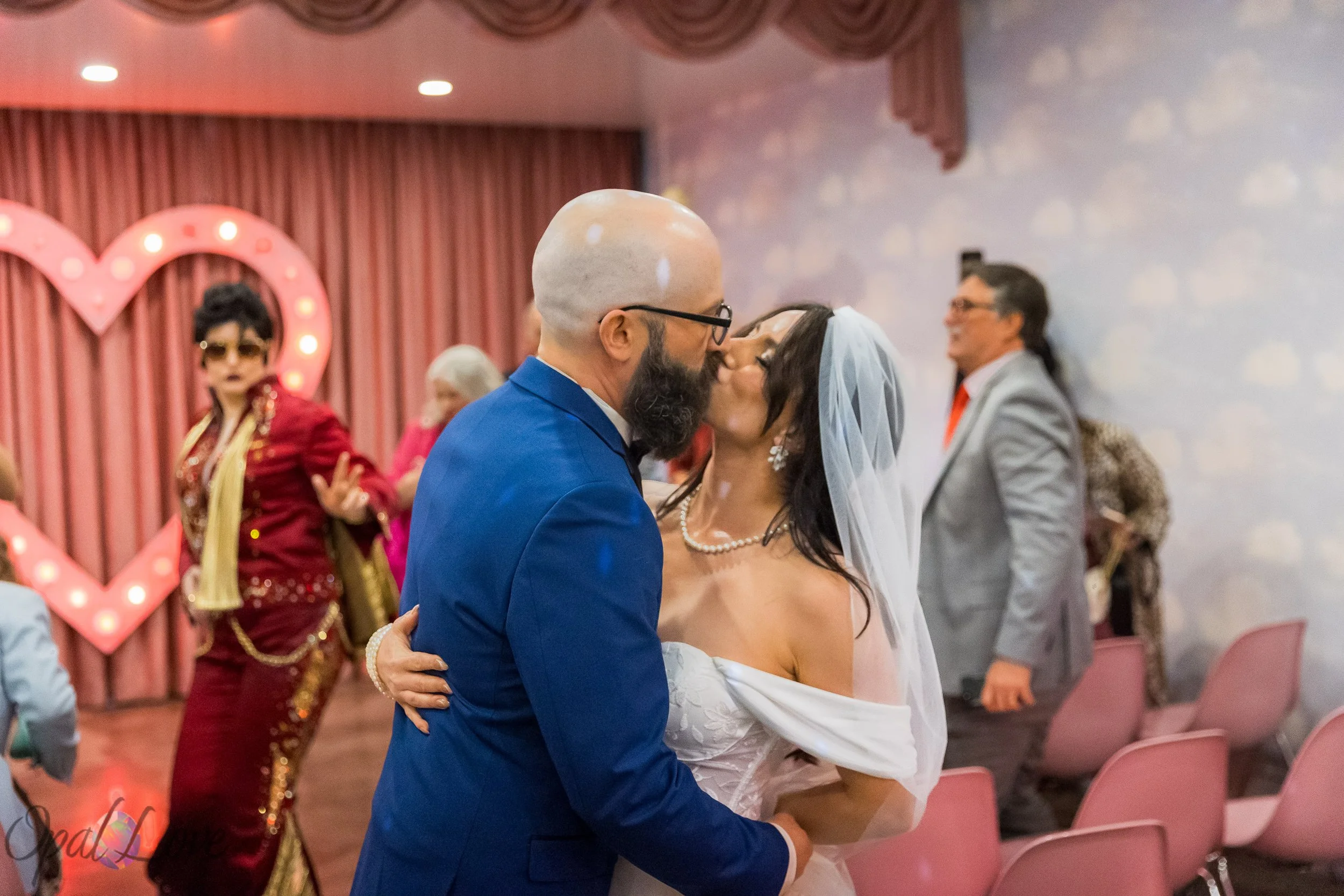 Bride and groom celebrating affordable Vegas wedding with candid portraits