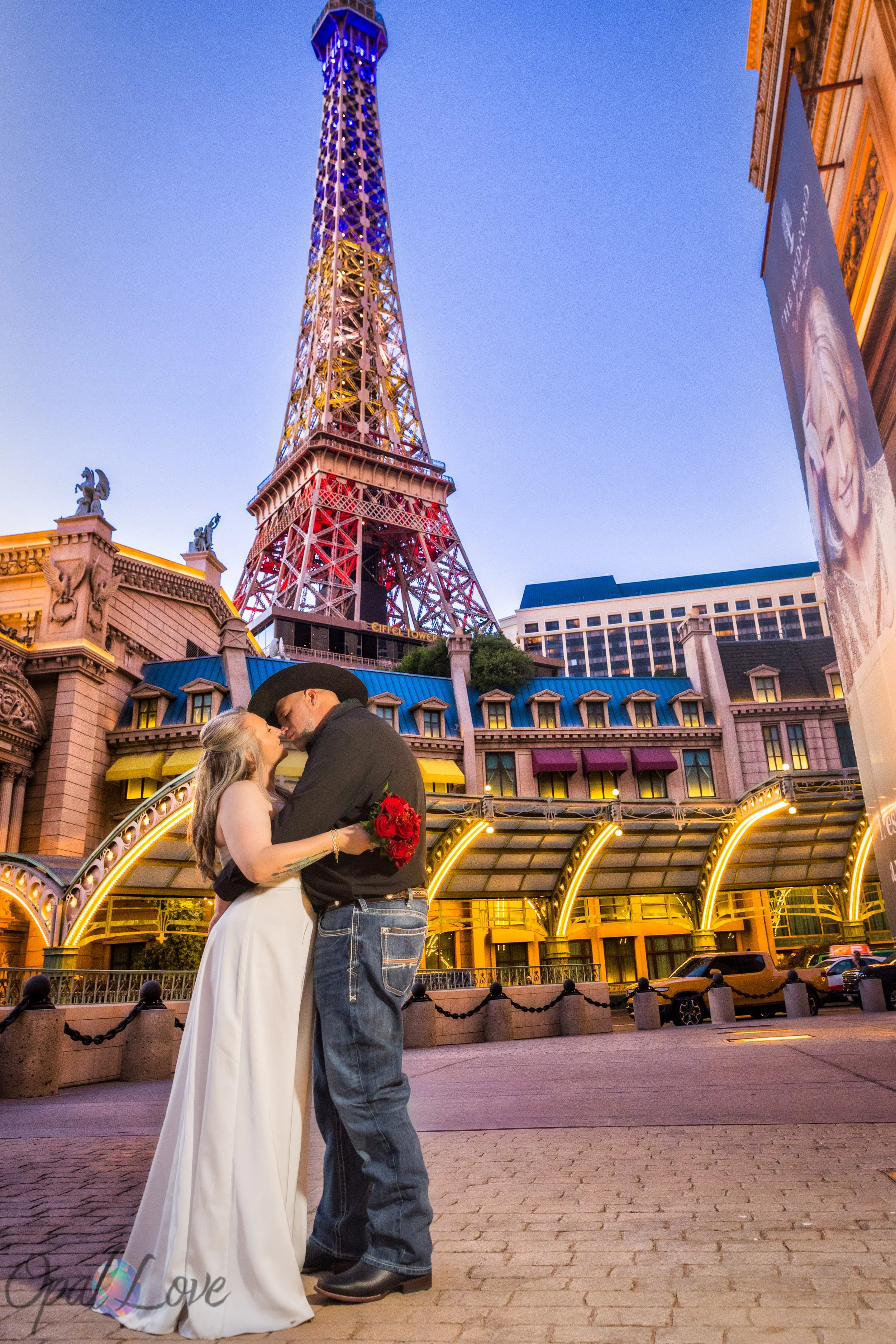 Couple kissing in front of Eiffel Tower at Paris Las Vegas on the Las Vegas Strip