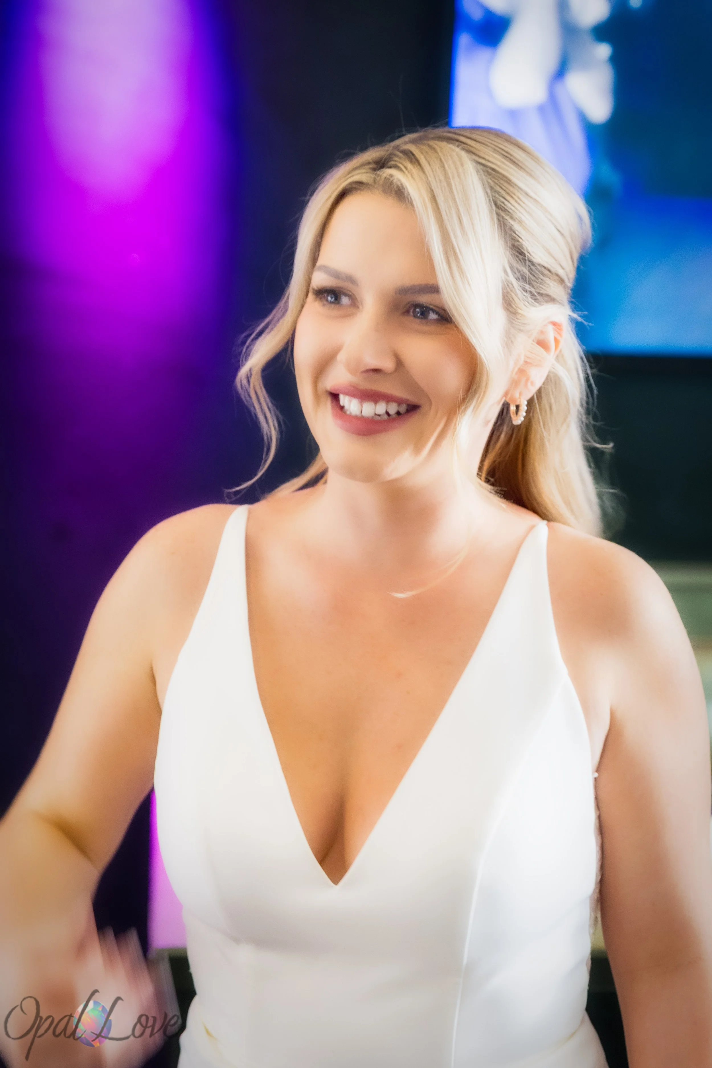 Bride smiling during getting ready at Taco Bell Cantina Las Vegas before her wedding ceremony.