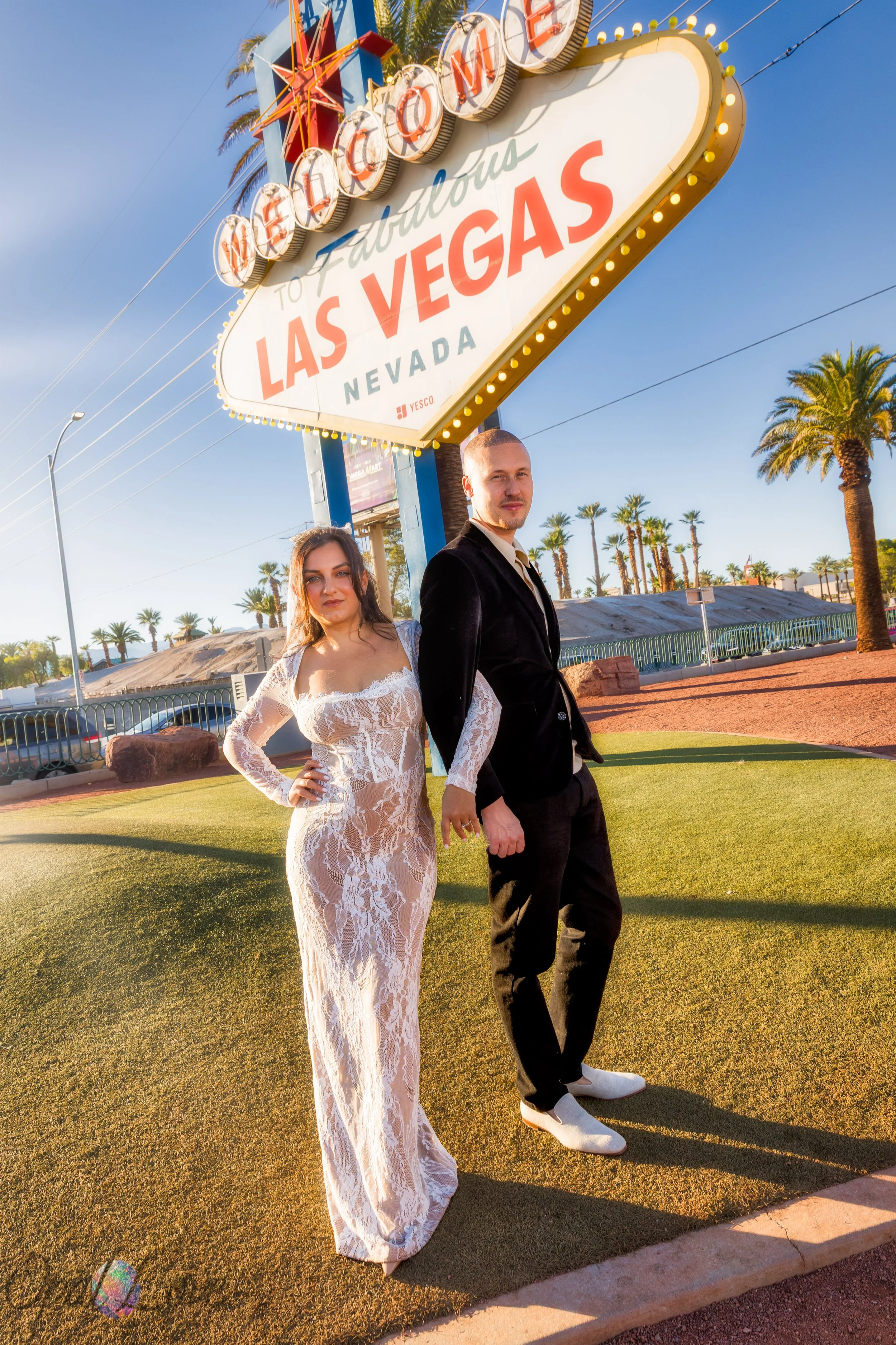 Bride and groom at Welcome to Las Vegas Sign wedding photos after ceremony