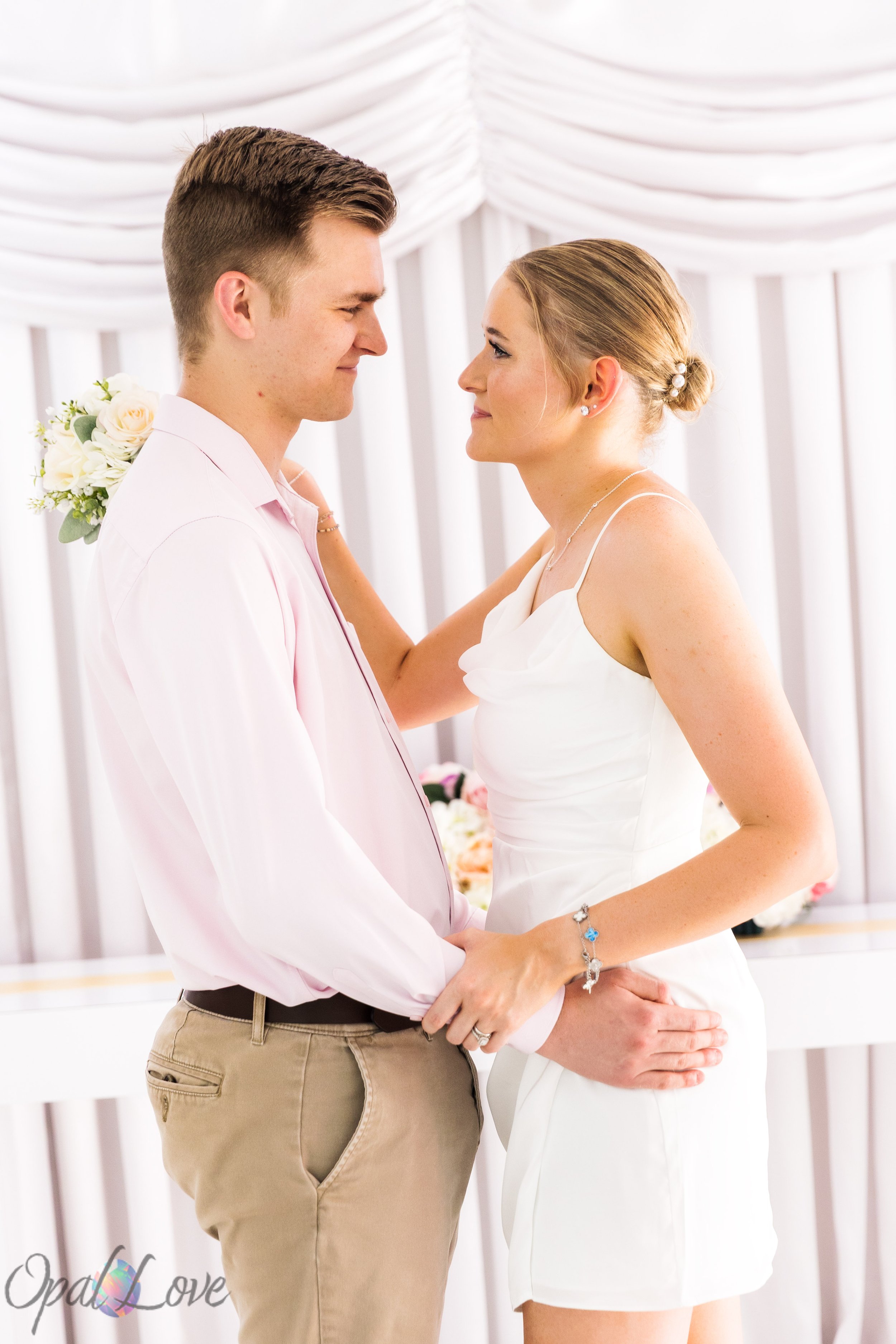 Katie and Ryan sharing a close portrait inside the Little White Wedding Chapel during their vow renewal.