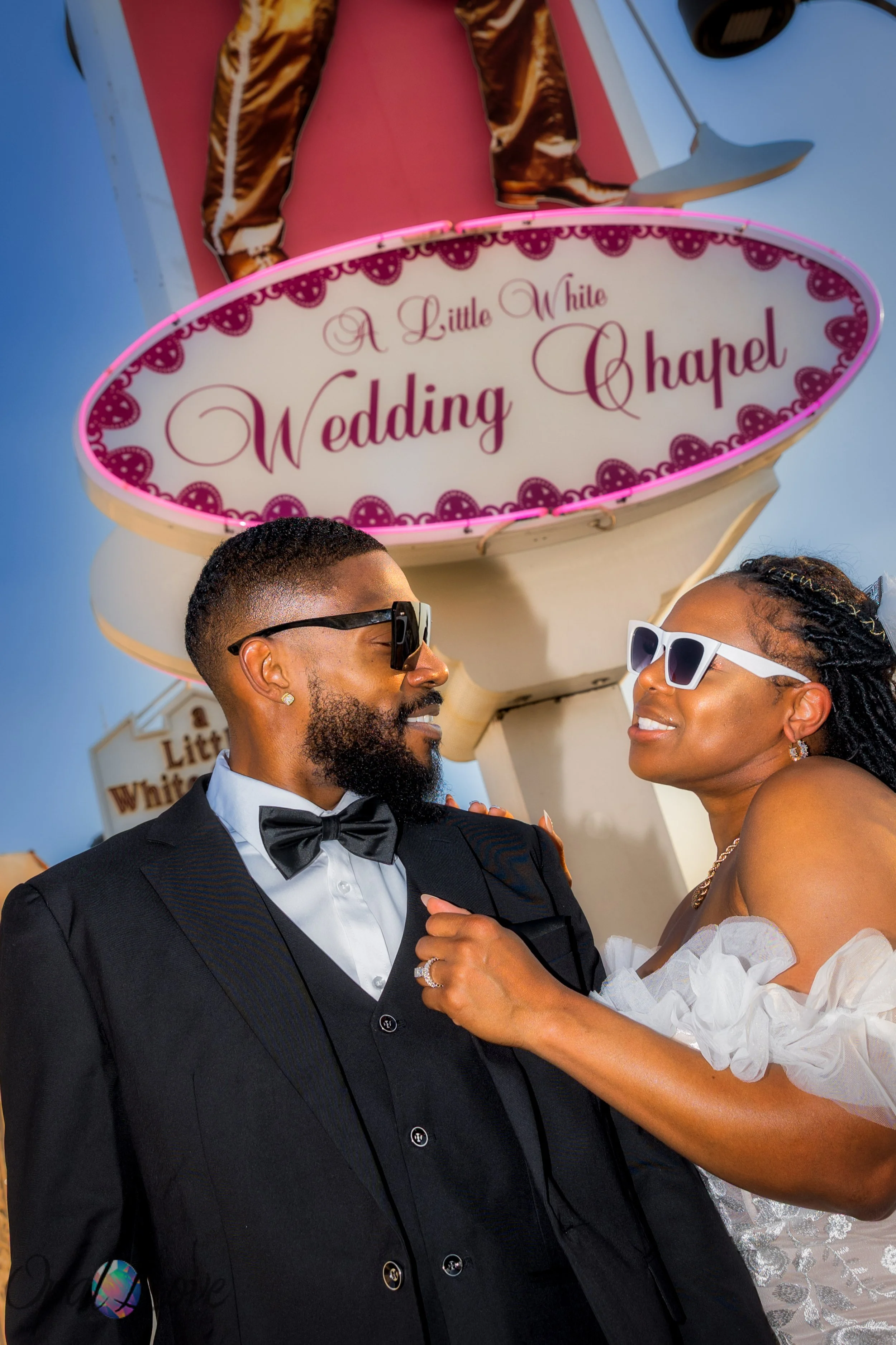 Fun Las Vegas elopement photo at the Little White Wedding Chapel captured by Opal Love Photography.