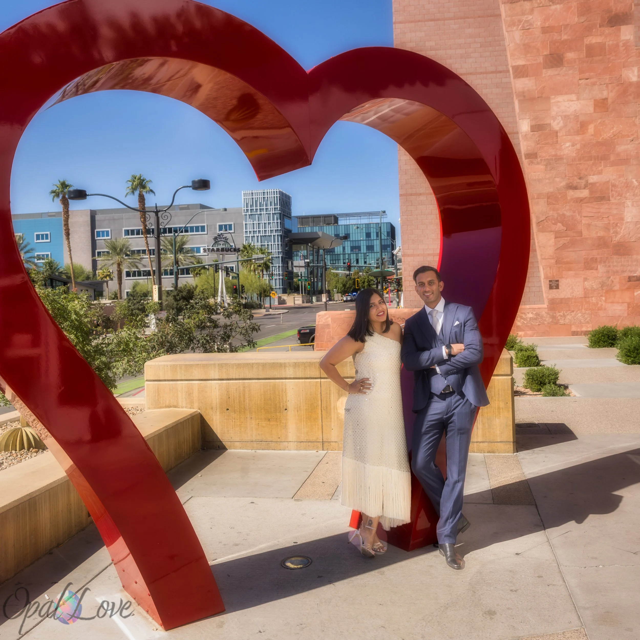 Couple posing outside the Las Vegas Courthouse after their intimate ceremony.