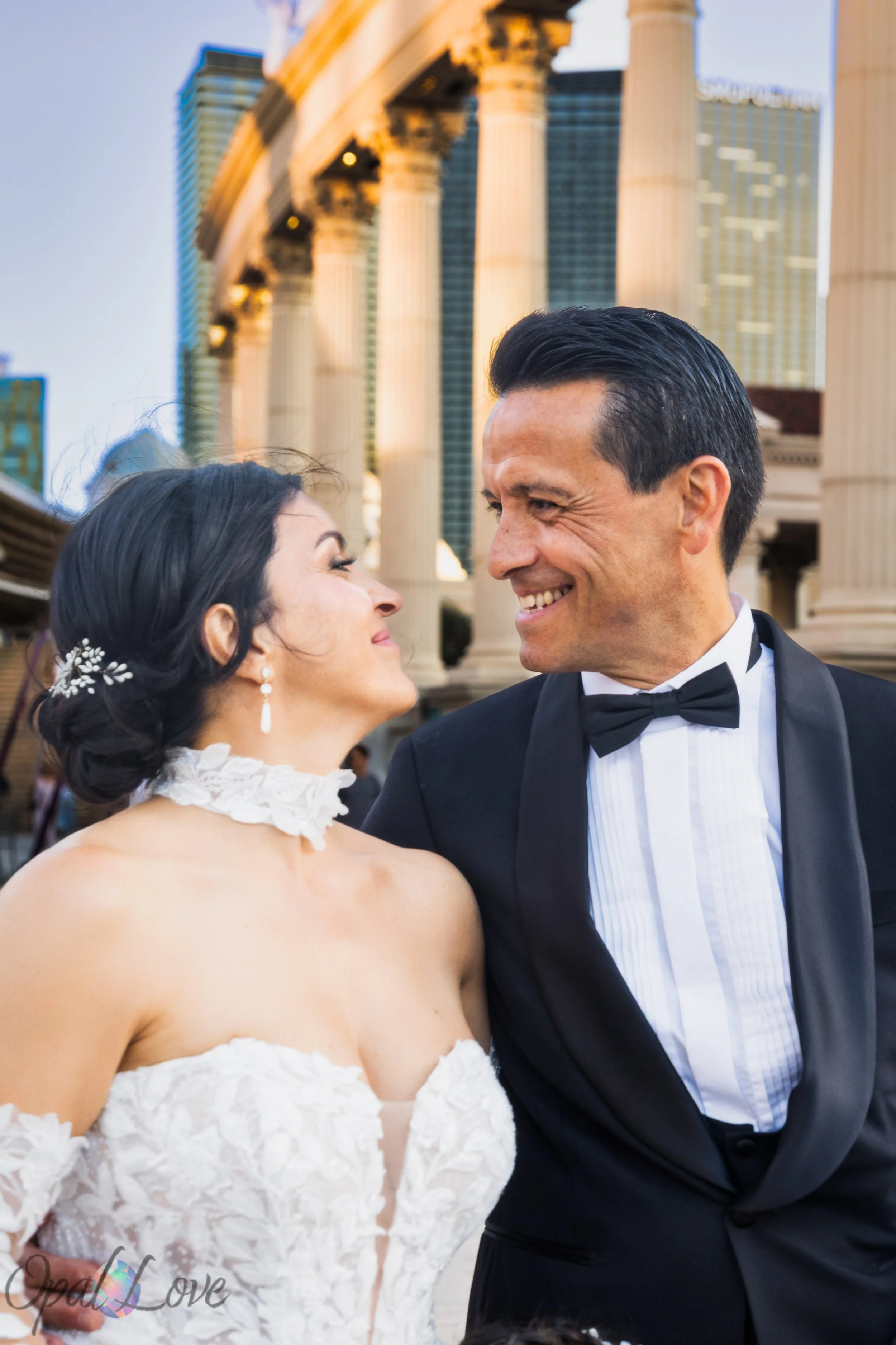 Wedding couple walking through Caesars Palace during Las Vegas wedding photography session
