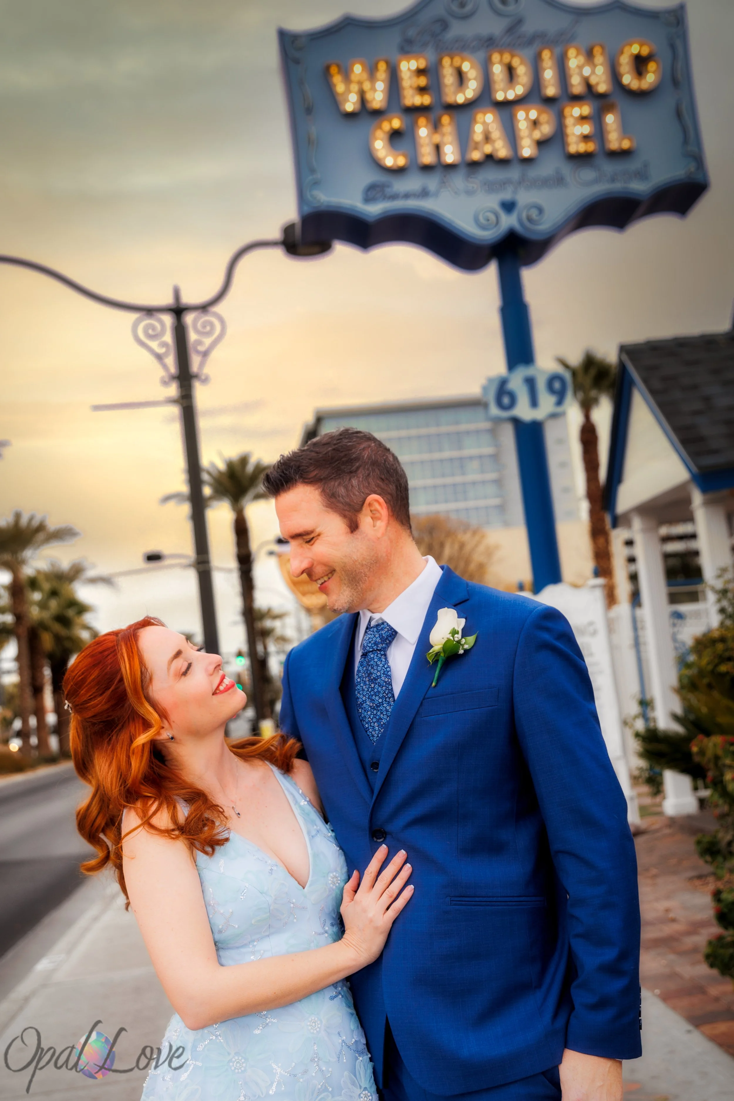 Newly married couple outside Las Vegas wedding chapel after ceremony