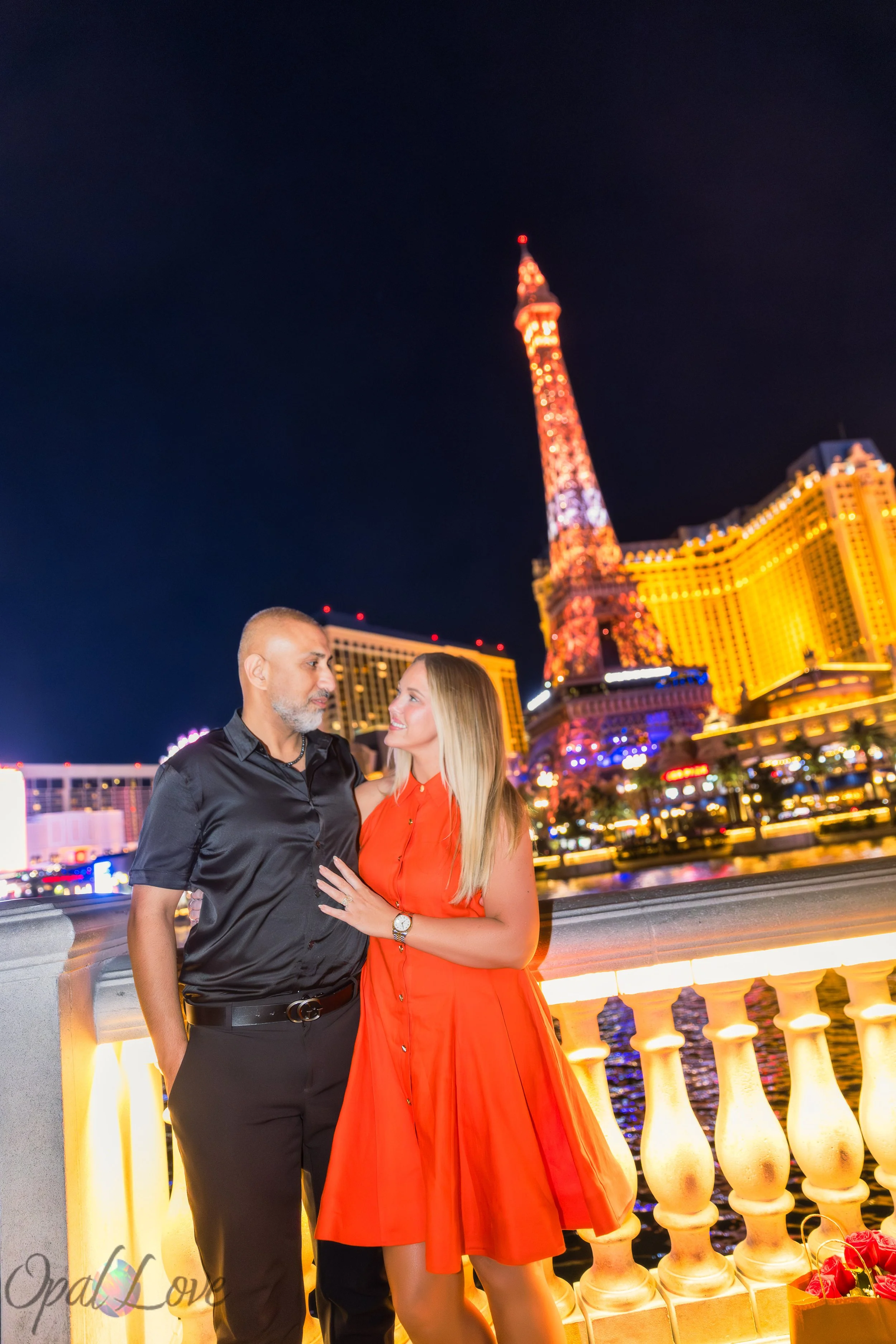 Sunny and Alicia with the Paris Las Vegas Eiffel Tower illuminated behind them