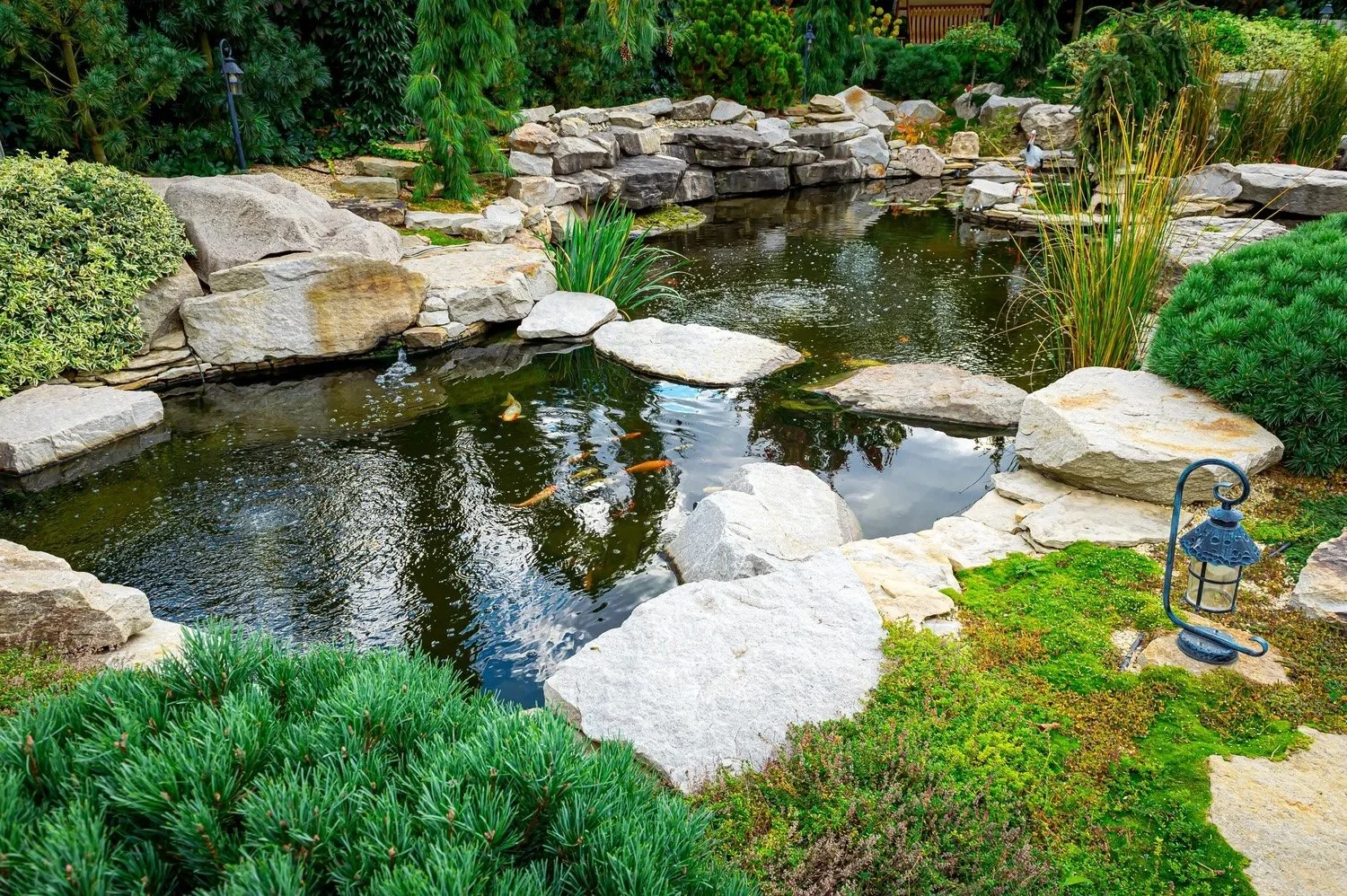 Expertly designed pond in Zachary, LA by trusted landscape professionals