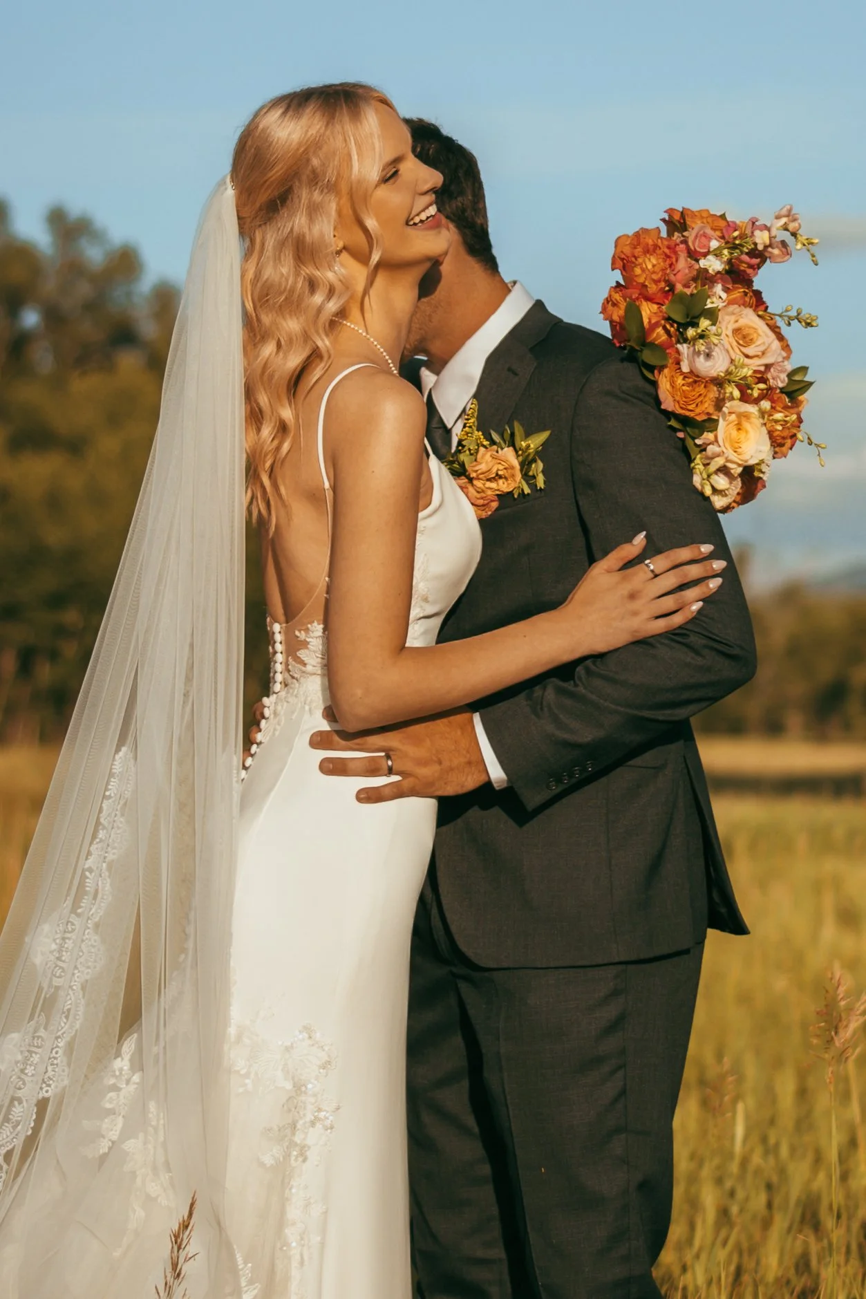 Bride and groom sharing a romantic moment at The Chateau Event Center in Bozeman, Montana during a luxury wedding, photographed by a professional Montana wedding photographer.
