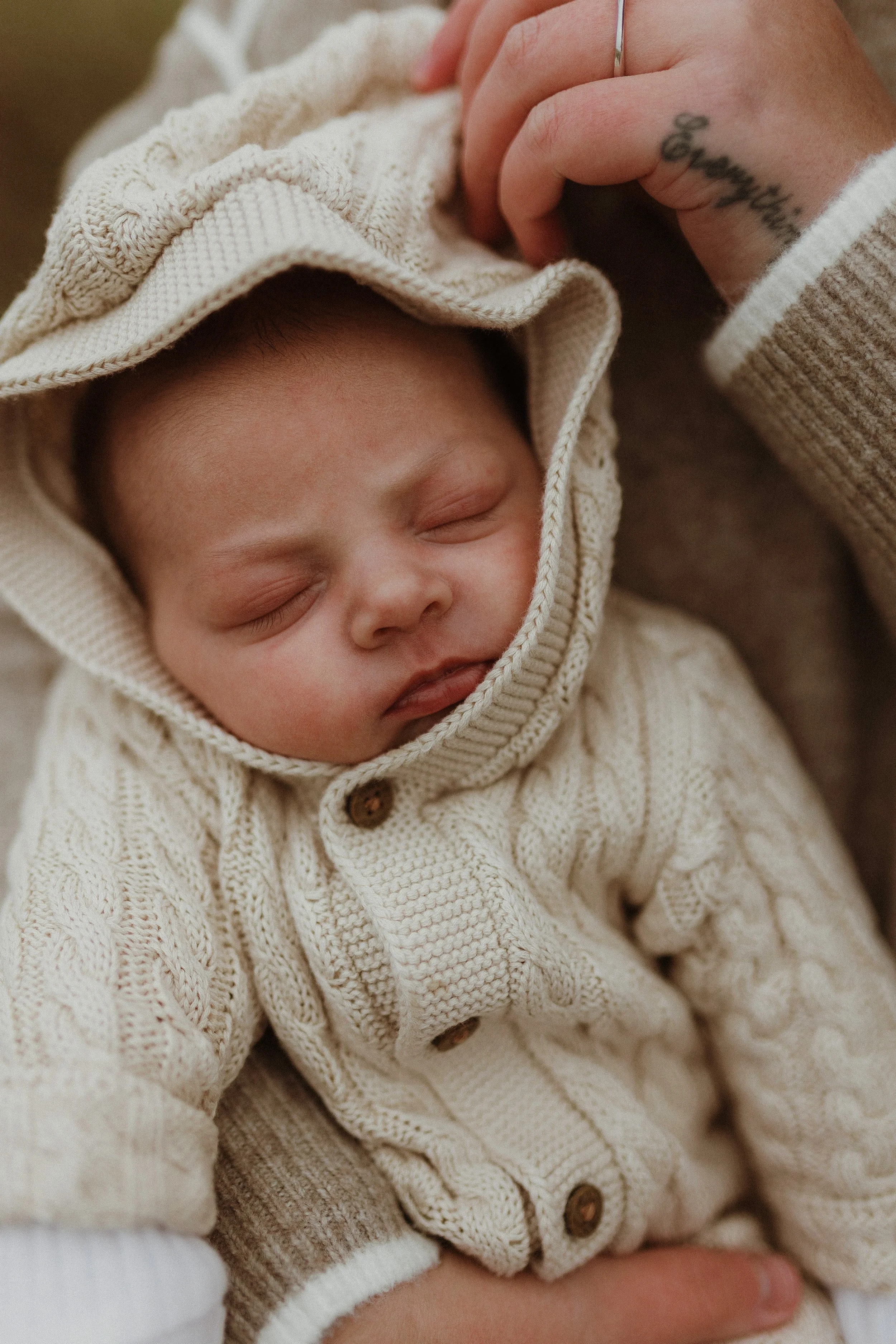 Newborn photography on the beach in Dorset