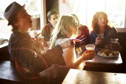 52095e433e6e1_Christian_Kozowyk_friends_at_bar.jpg