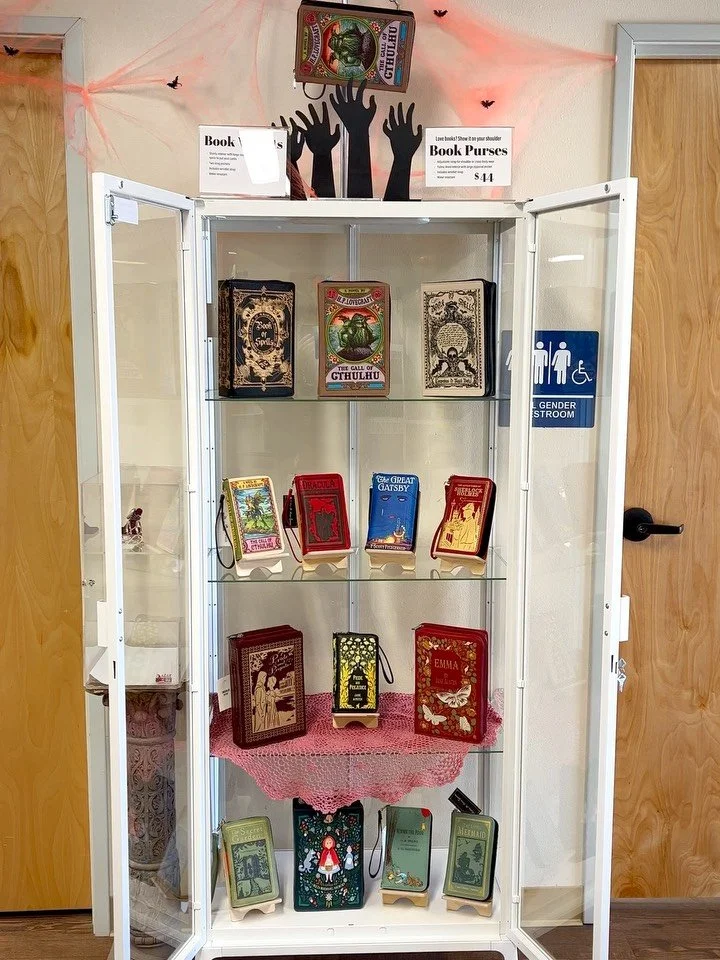 New spooky book purses and wallets are in! Get in the Halloween spirt with Cthulhu, Dracula, Book of Shadows, and even a little fairy tail like Red Riding Hood. Find them at the front of the store🕸️

#halloween #spooky #books #bags #bookstore #abq