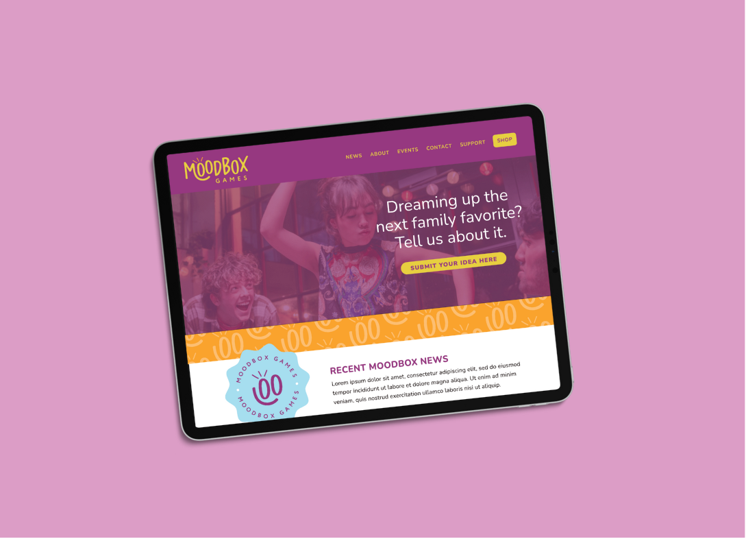 Website design by Allie Marie Design for Moodbox Games shown on tablet mockup featuring a playful layout and bold brand colors