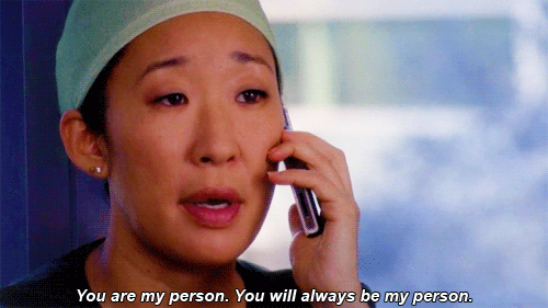 Gif of Cristina Yang, MD, PhD, from Grey's Anatomy wearing scrubs and holding her phone saying, "you are my person. you will always be my person" to Meredith Grey.
