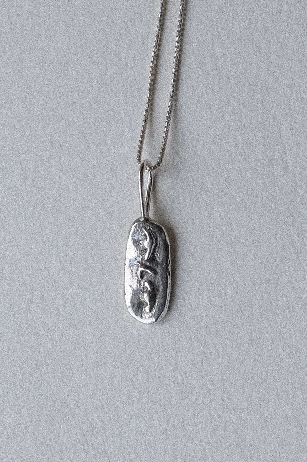 Face Pendant