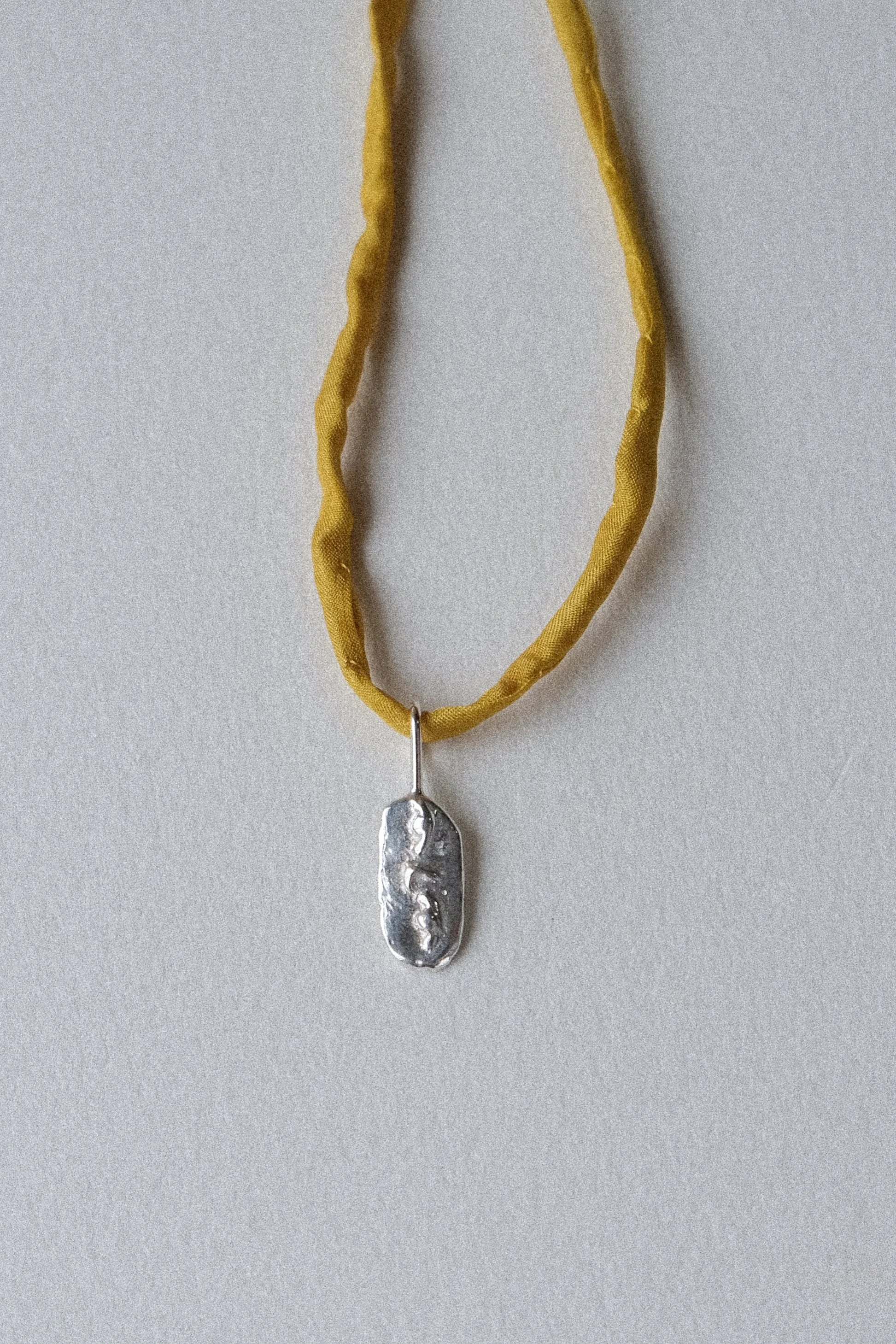 Pendant on Silk #5 Silver face