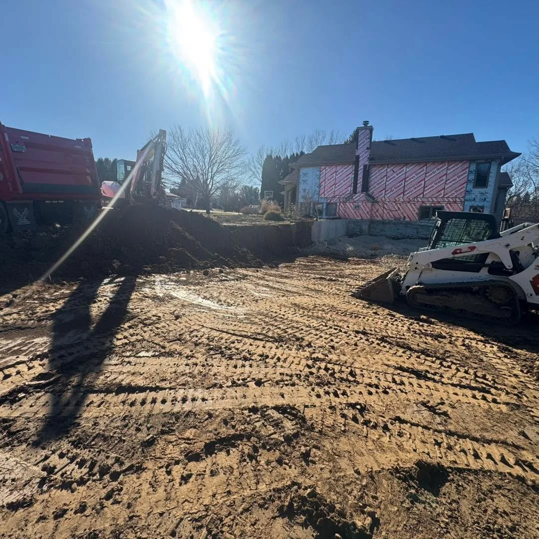 Two day job in Sun Prairie for Warren and Gavin! They dug for a garage addition about 5 feet below grade, then came back once the foundation was poured to backfill and grade the driveway. 

#tcrservices #quadaxle #homeaddition #dump #HaulingServices 