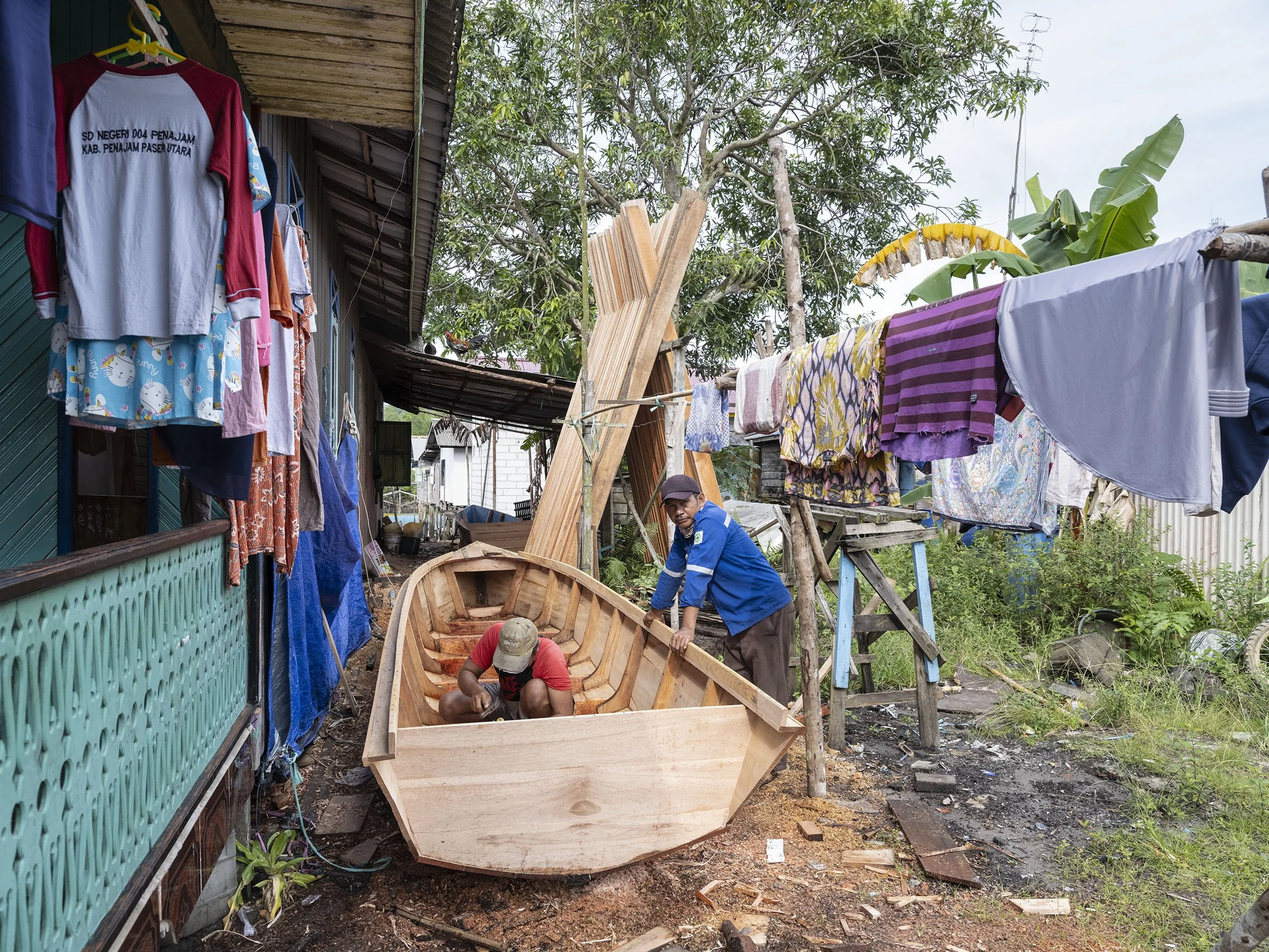Fishing village Pantai Lango in Balikpapan Bay, the gateway over water to Nusantara. Locals fear pollution and disruption of marine wildlife due to increasing traffic and industrial activity. September 6, 2022.