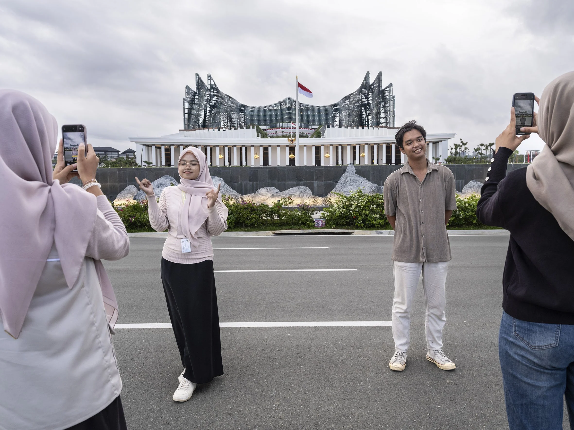 Daytrippers posing in front of the Garuda-shaped Presidential Palace, designed by Indonesian artist Nyoman Nuarta. 16 August 2025
