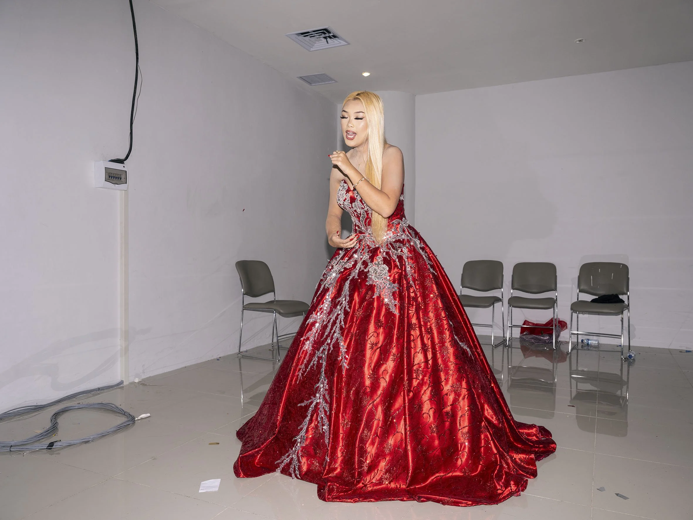 A singer rehearses backstage before performing at the El John Pageant festival, a beauty contest that promotes tourism, environmental, and educational awareness. It’s the first time the festival has been organised in Nusantara. August 25, 2025