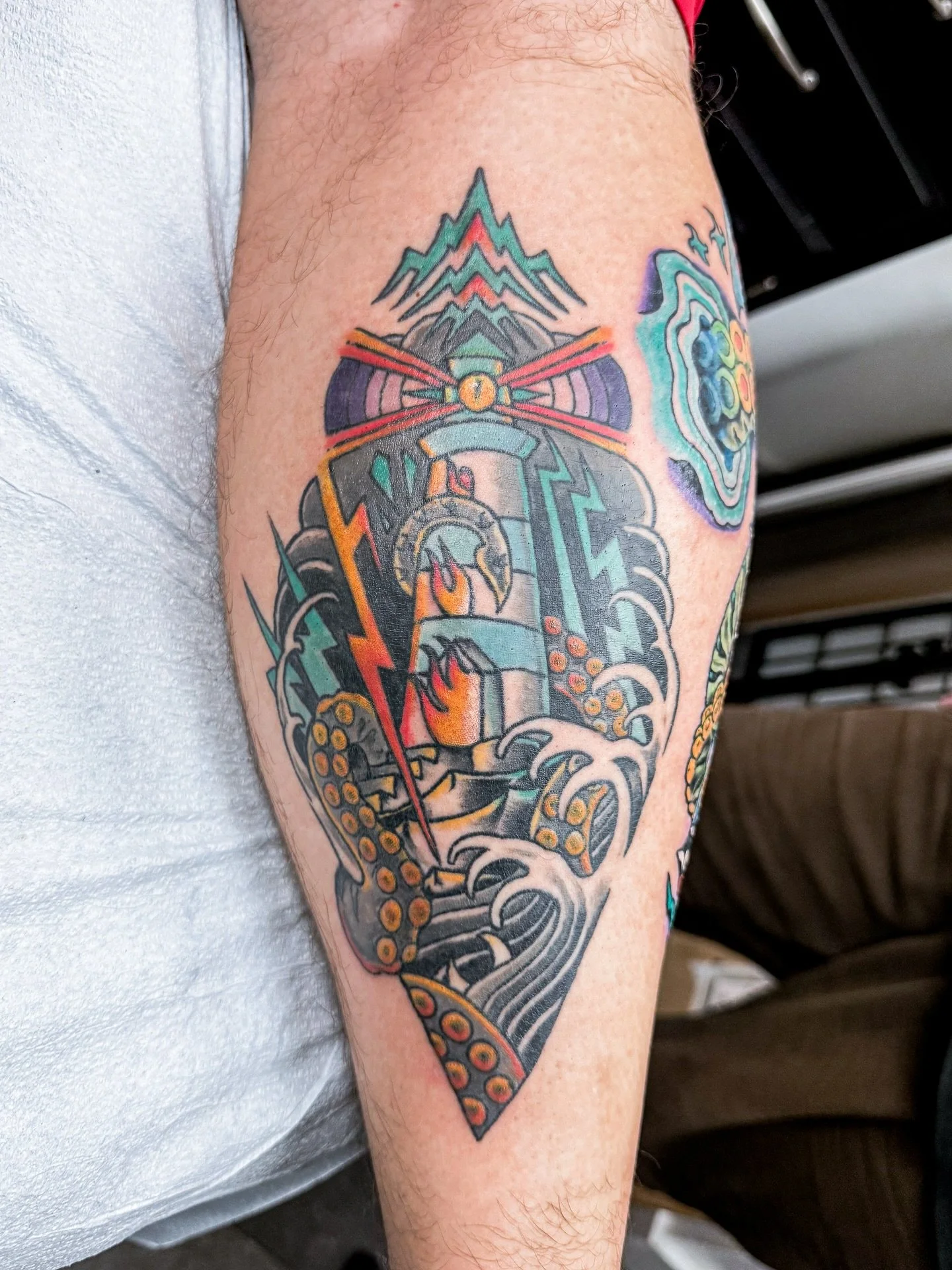 Ryan&rsquo;s healed lighthouse tattoo 🚢✨🌊

1 year later and the colors healed up great! Thank you for visiting Happy Yokai Tattoo during your trip and coming back a second time to get another custom tattoo by @1000yokai 🔥&nbsp;We can&rsquo;t wait 