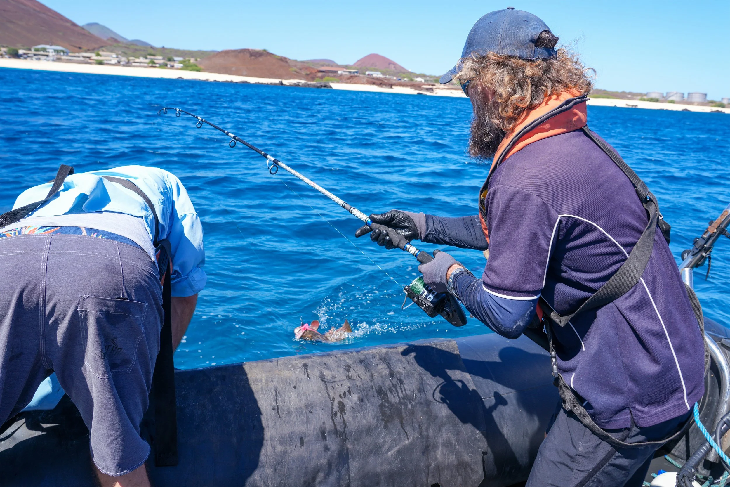 8 Dan reeling fish in Wide.jpg