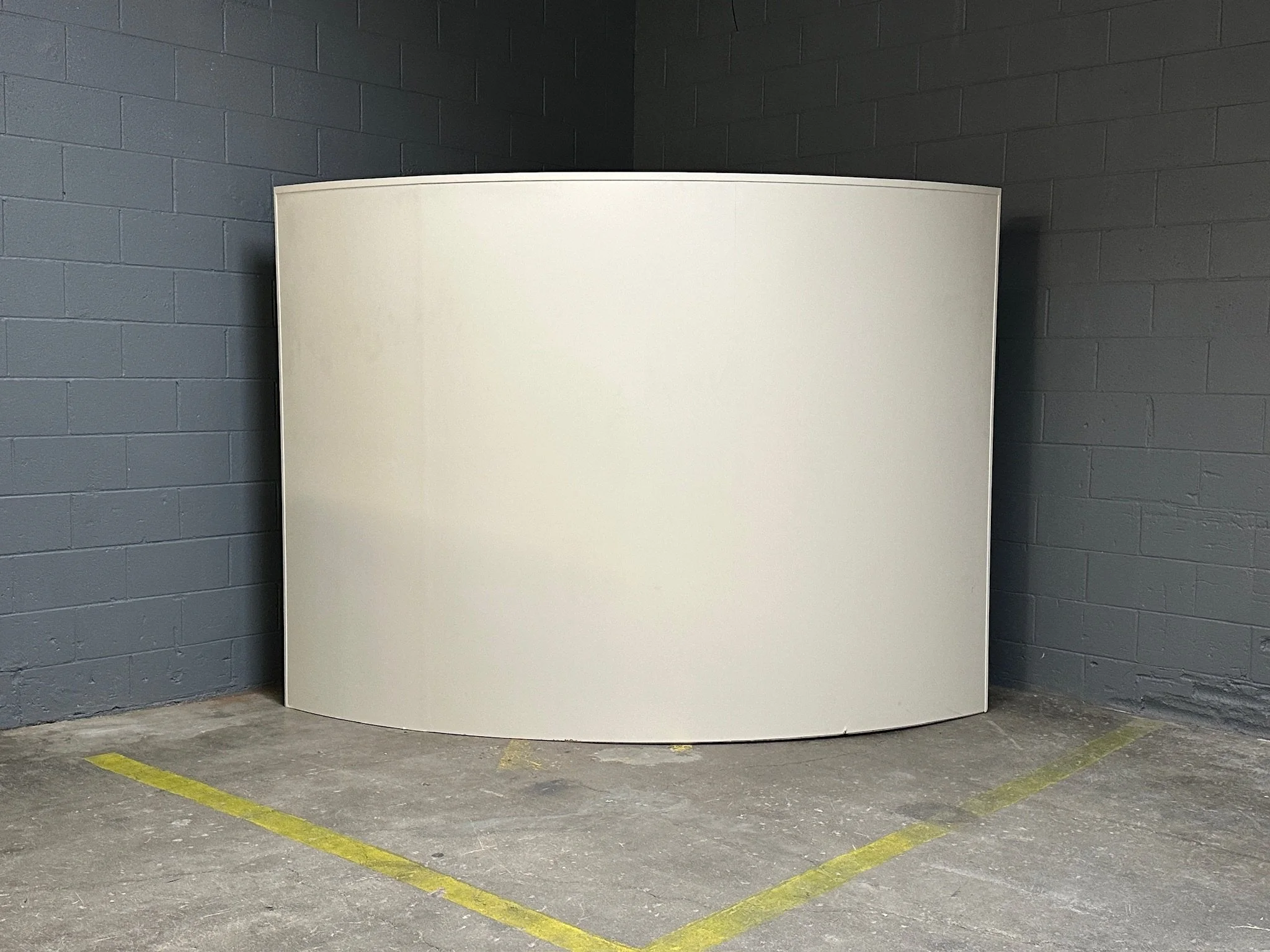 White curved bar smooth exterior view, set and prop rescued by RIG for event and production rental in Los Angeles.