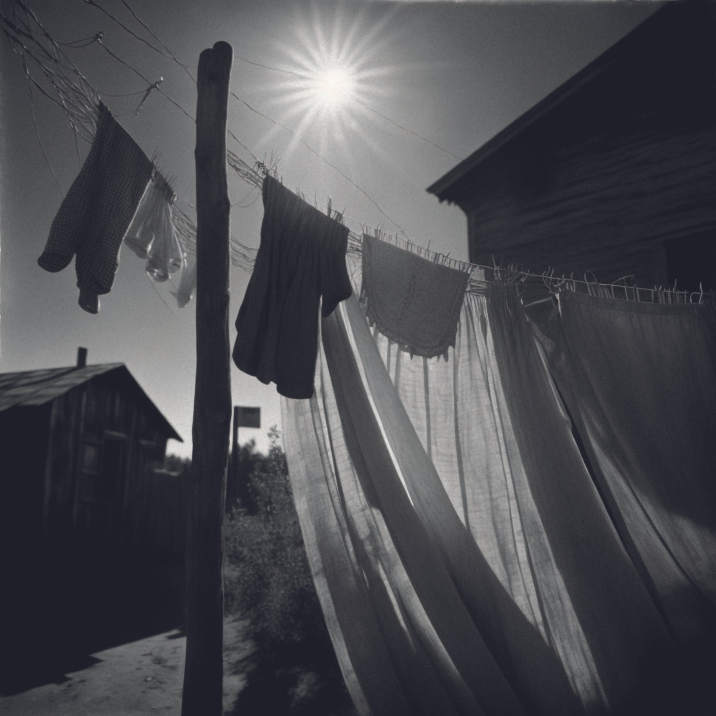 american-ghostskomak_Closeup_of_cloths_laid_on_wire_high_wind_middle-class_woo_d8f28a19-723d-46a7-a058-af3a2c38fa15-gigapixel01-standard-scale-4_00x.jpg