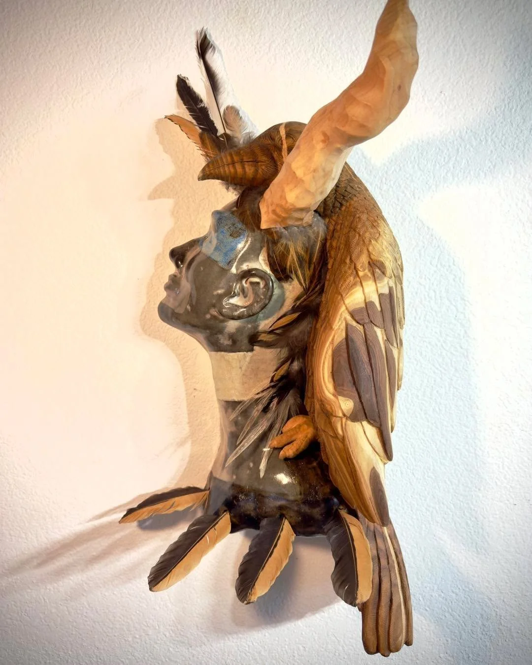 This fun new piece was made in a crossover class at Groundwork art lab. We&rsquo;ve got ceramics Wood and chicken feathers. So much fun.