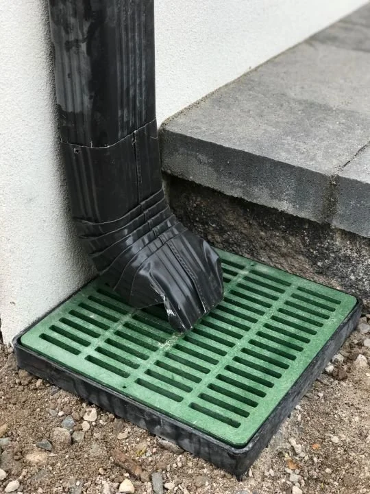 Downspout into Catch Basin.jpg