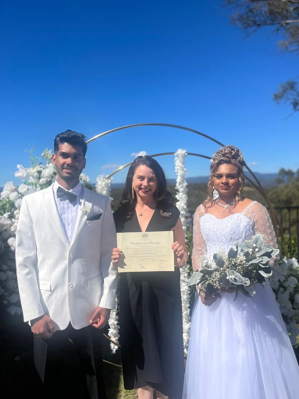 Dee with happy couple after just married.JPG