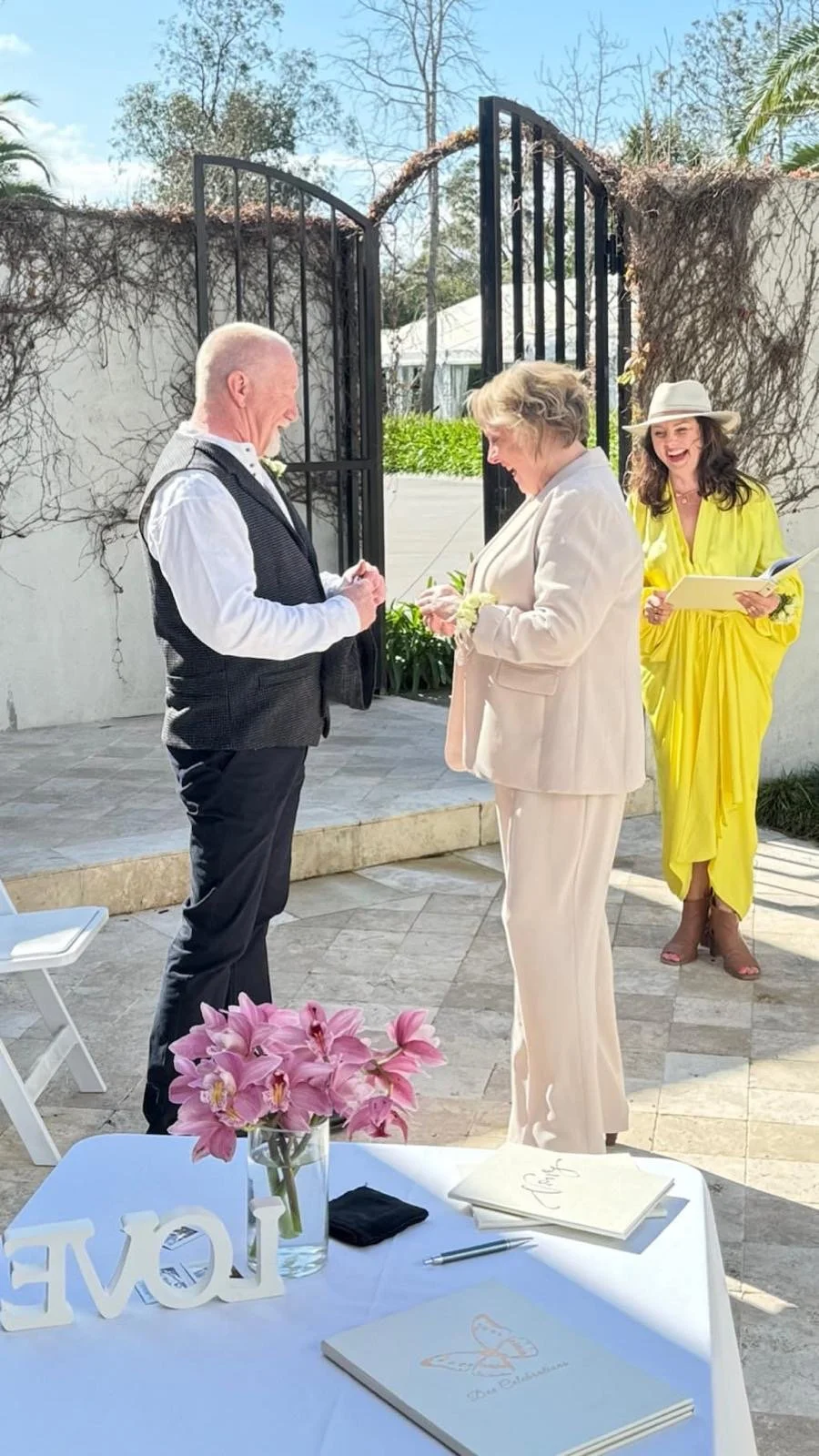 couple at wedding ceremony with celebrant Dee.JPG