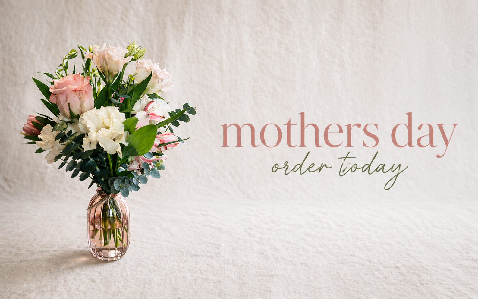 A floral arrangement with pink and white flowers in a pink glass vase, and text that says 'mothers day order today'.