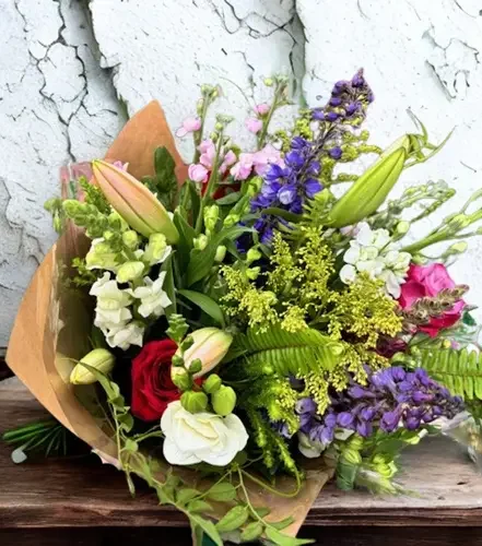 Bouquet of mixed flowers including lilies, roses, and delphiniums Florist Havelock North delivering fresh flowers Hastings, Havelock North and Napier