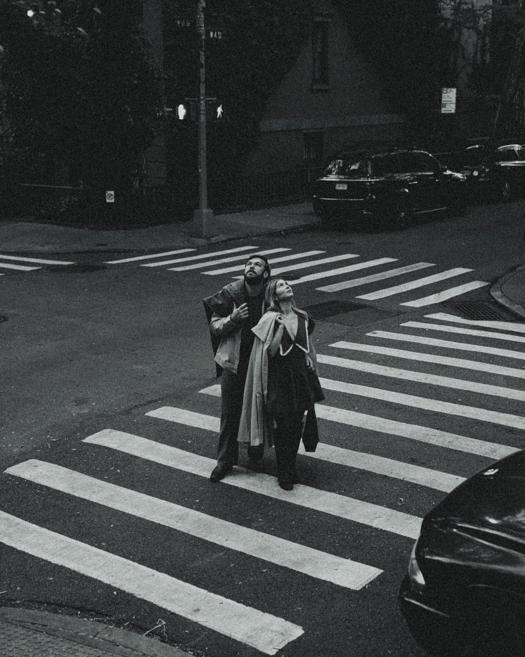 Couple walking in West Village during cinematic NYC photoshoot