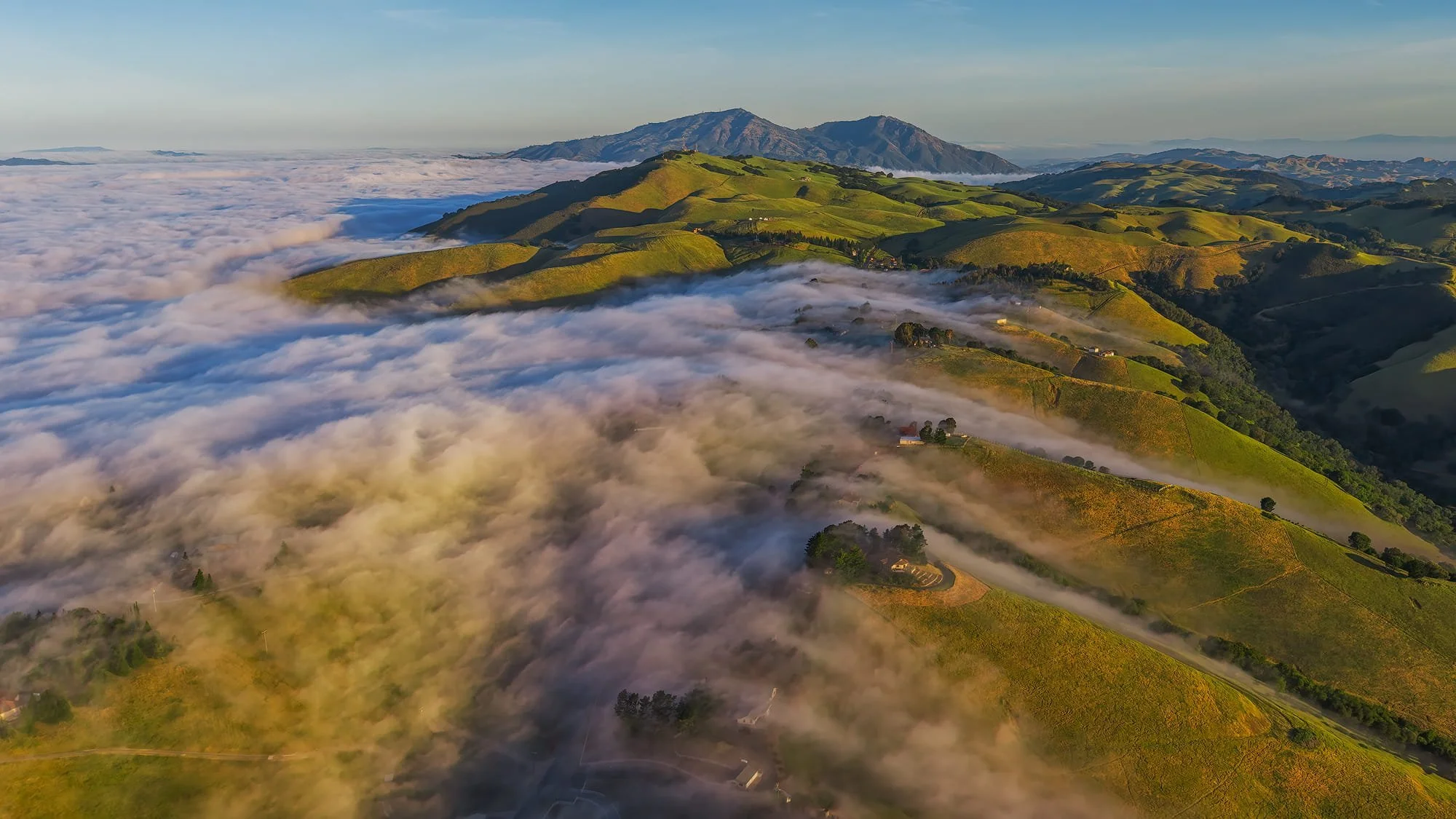 Fog Invasion by Jay Huang.

 Taken over Morgan Territory Area during the sunrise.