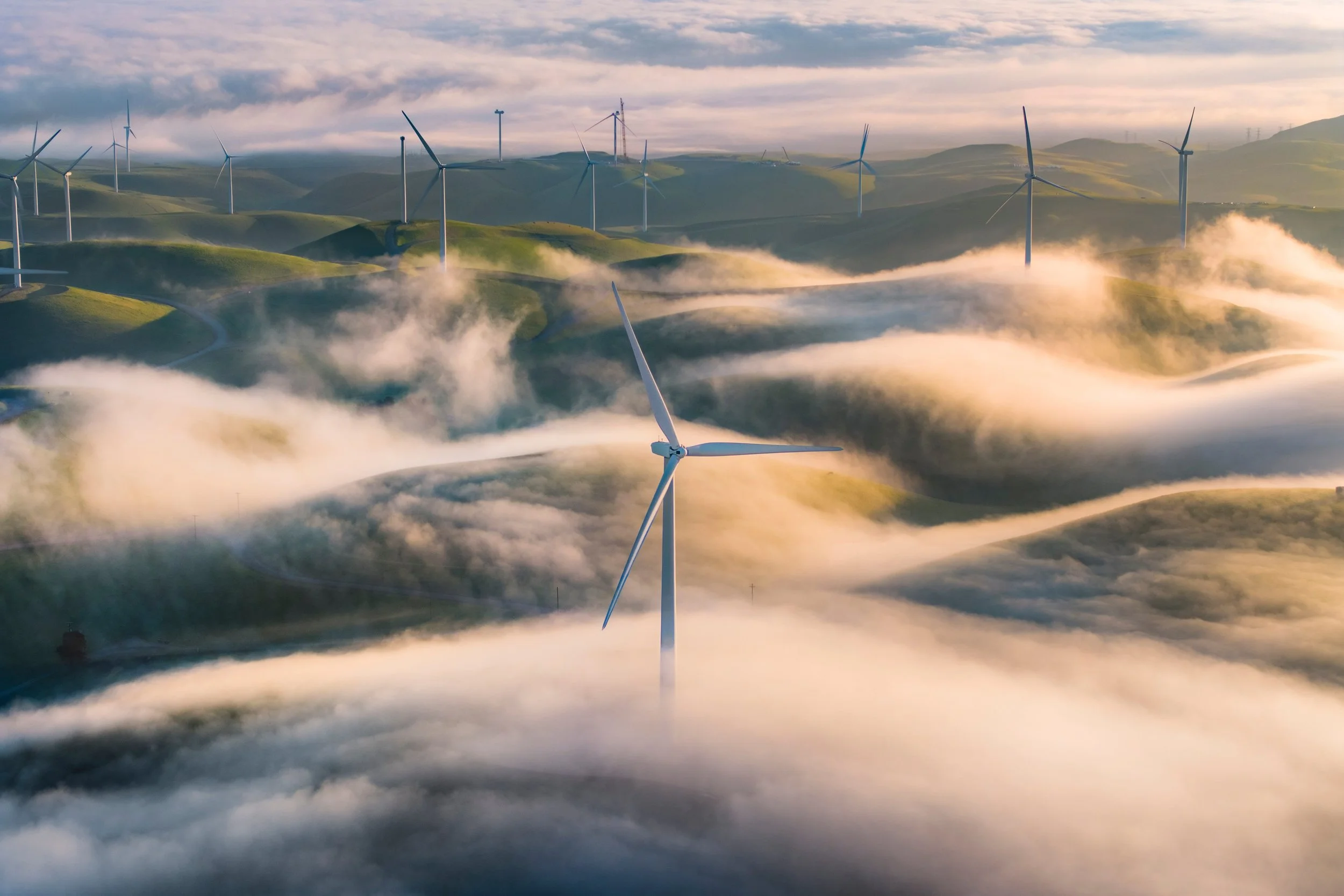 Fogmill by Josh Dye. 

A windmill stands above the low fog that is slowly creeping over the Altamont Pass on a chilly January morning as the sun and shadows create a balance to the scene.