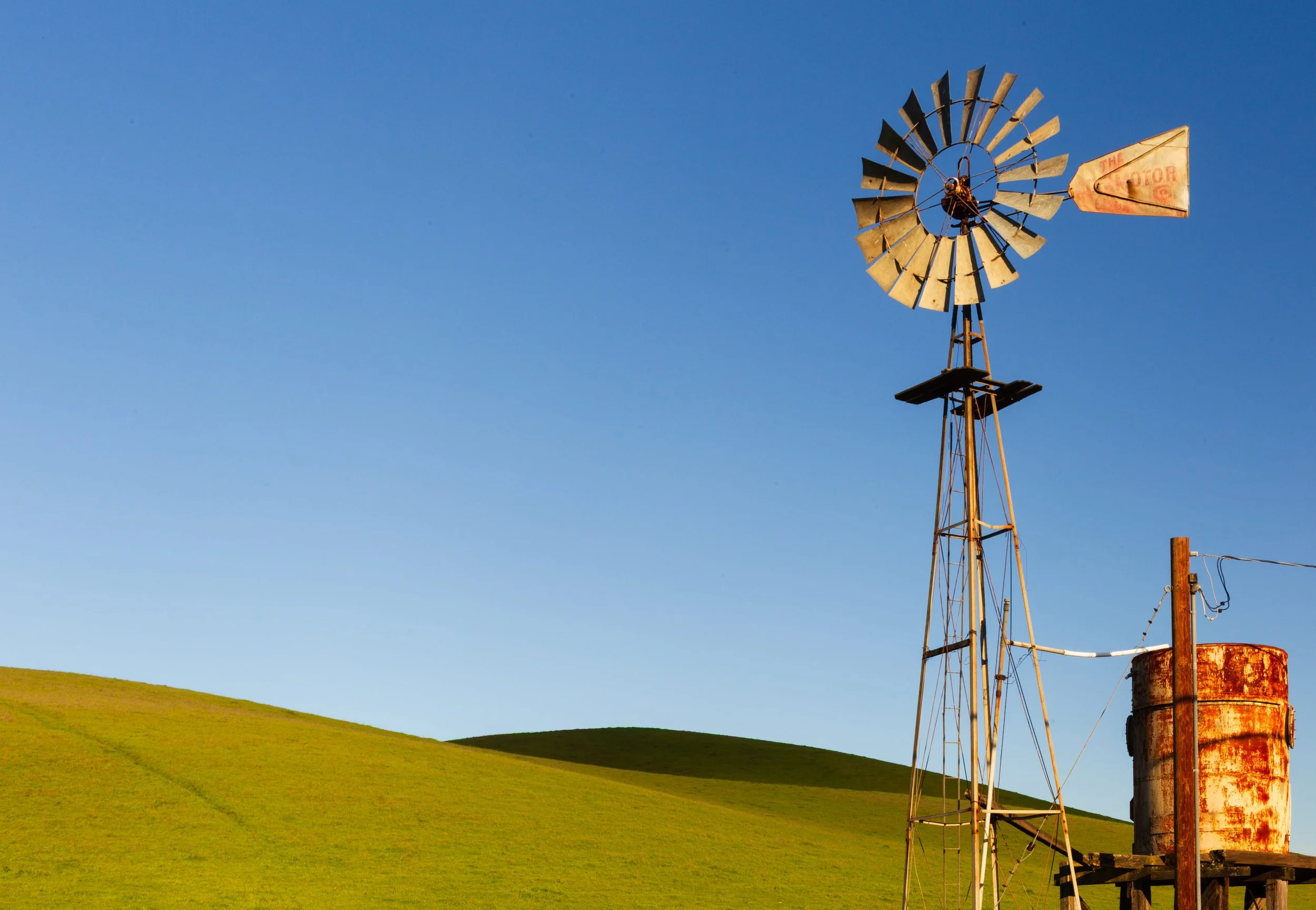 Old Windmill by Nancy Wright.

 An old windmill on Collier Canyon Road, Livermore. This windmill has fallen into disuse after standing at the top of Collier Canyon for years.