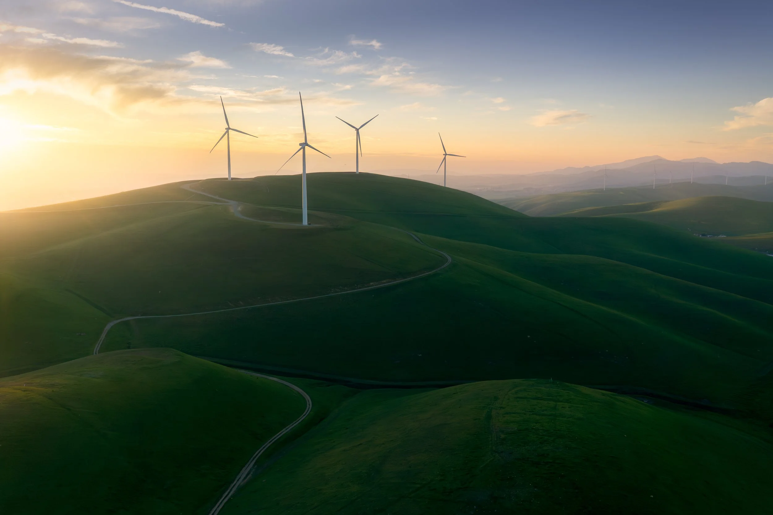 The Sentinels by Rajesh Subramanian. 

Photographed near Altamont Pass, I’ve always been fascinated by how these majestic windmills —though man-made—possess a unique ability to blend seamlessly into the undulating rolling hills. I was drawn to the co