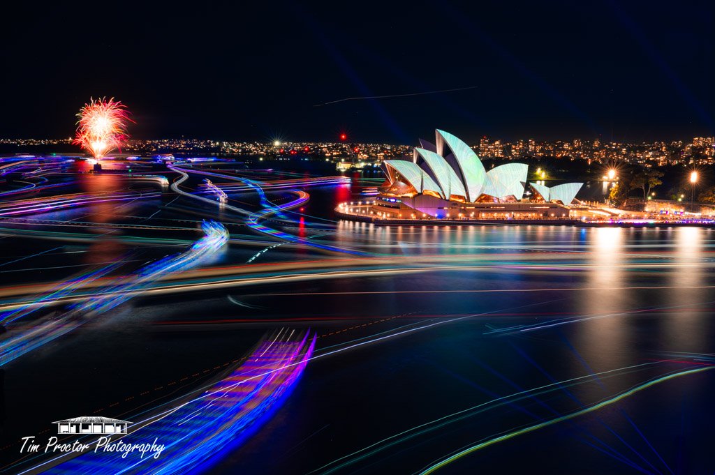 The waters of Sydney harbour lit up by a dazzling array of colours during the annual vivid festival!