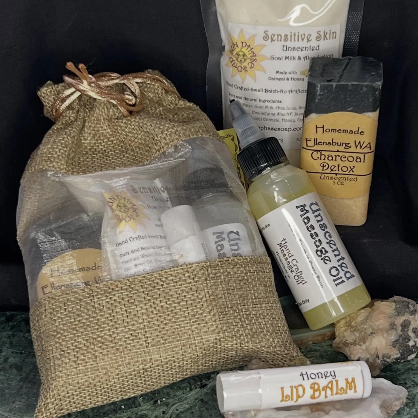 Another set of samples. Made to pamper yourself. Lotion, massage oil, lip balm, and 1/2 bar soap. Hopefully will be sold in local stores!