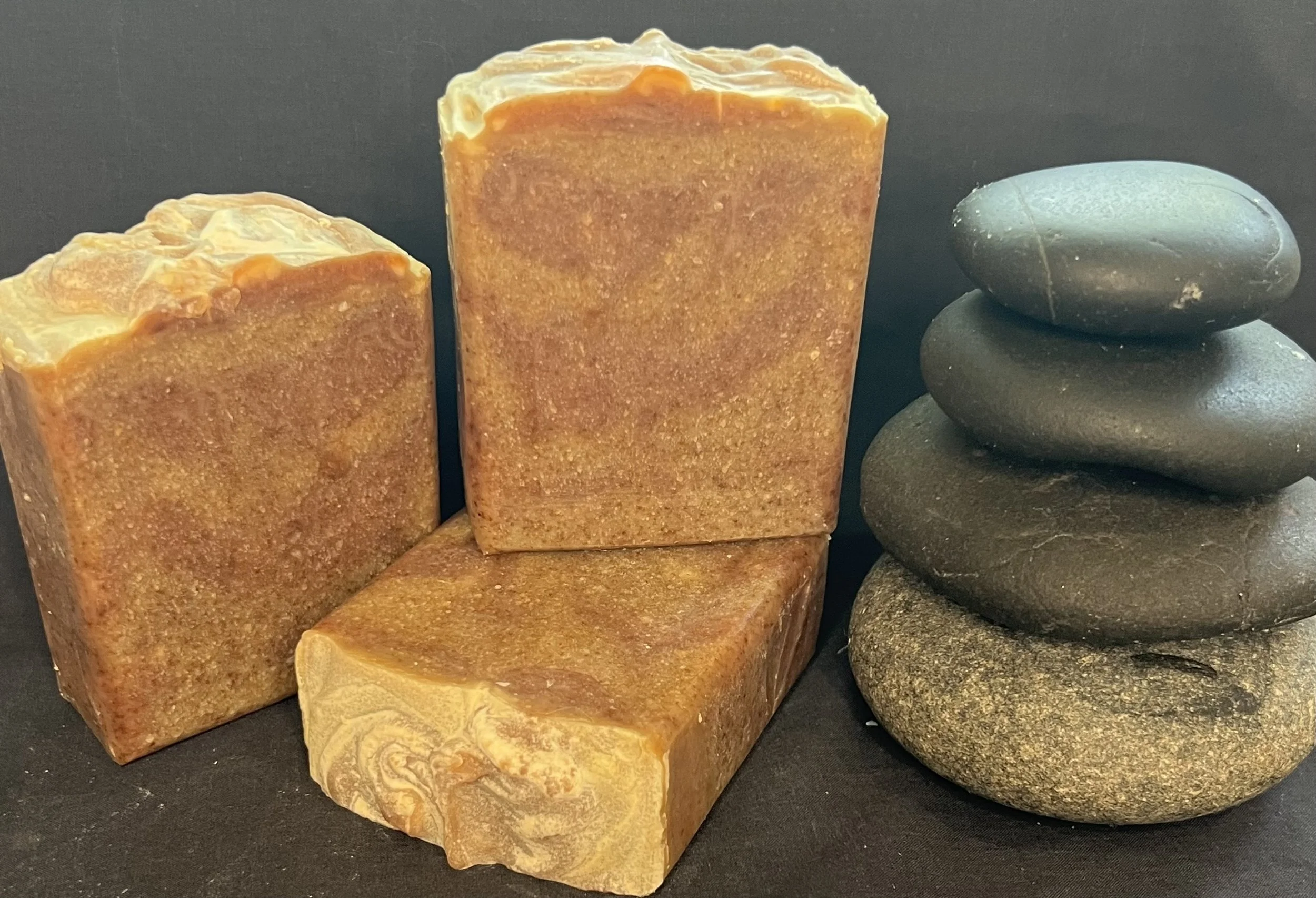 Vegan soap with a warm patchouli and Nag Champa scent, naturally colored and enriched with persimmon to help reduce Nonenal odor for fresh, clean skin.