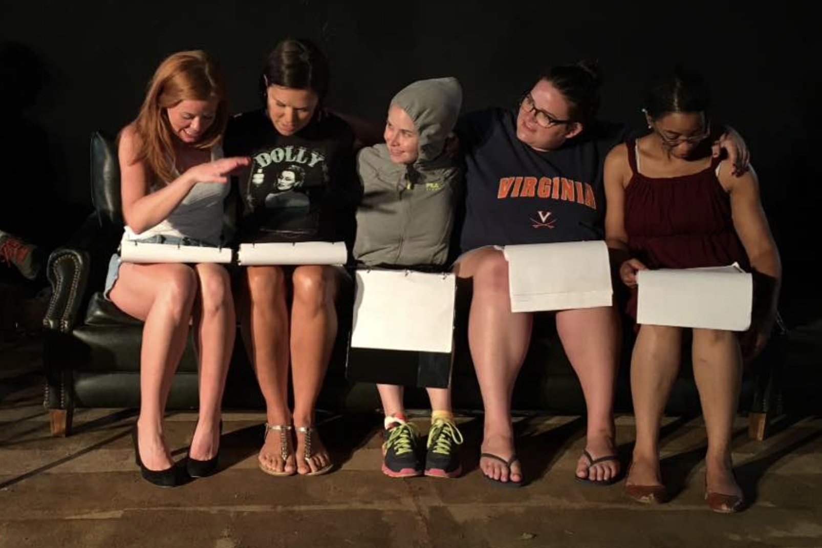Group of women in rehearsal practice text work