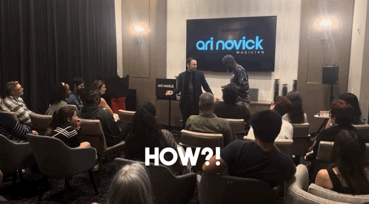 Ari Novick performing corporate magic at an event in Atlanta.
