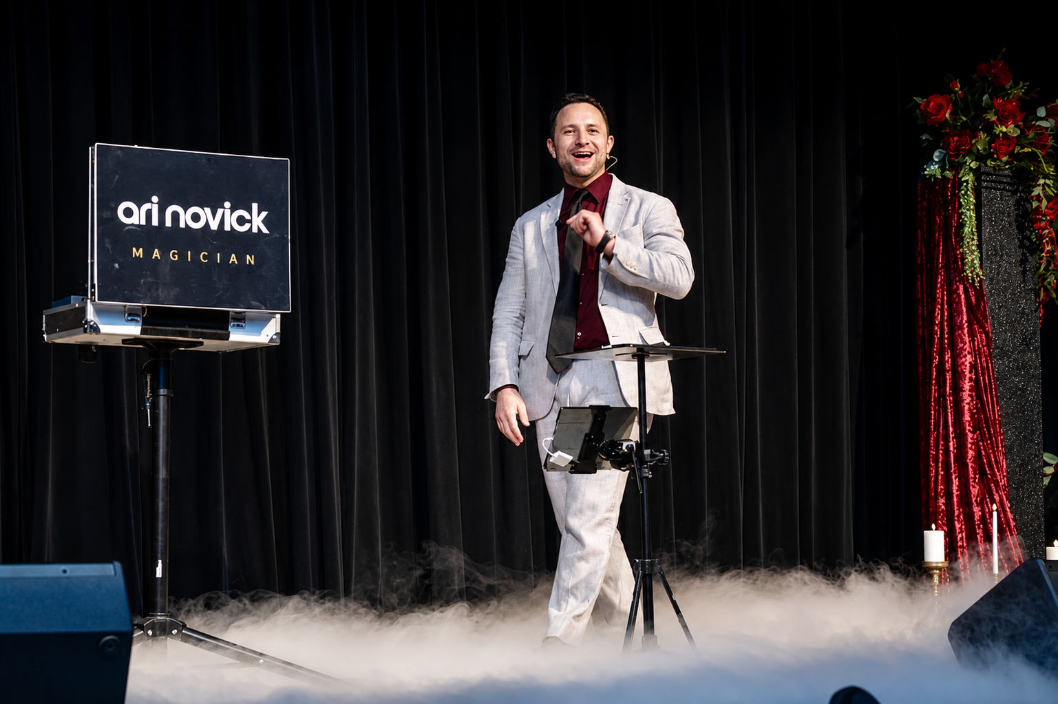Corporate magician Ari Novick performing interactive magic at a corporate event in Connecticut.