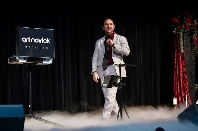 Ari Novick delivering high-impact magic entertainment at an Orlando corporate event.